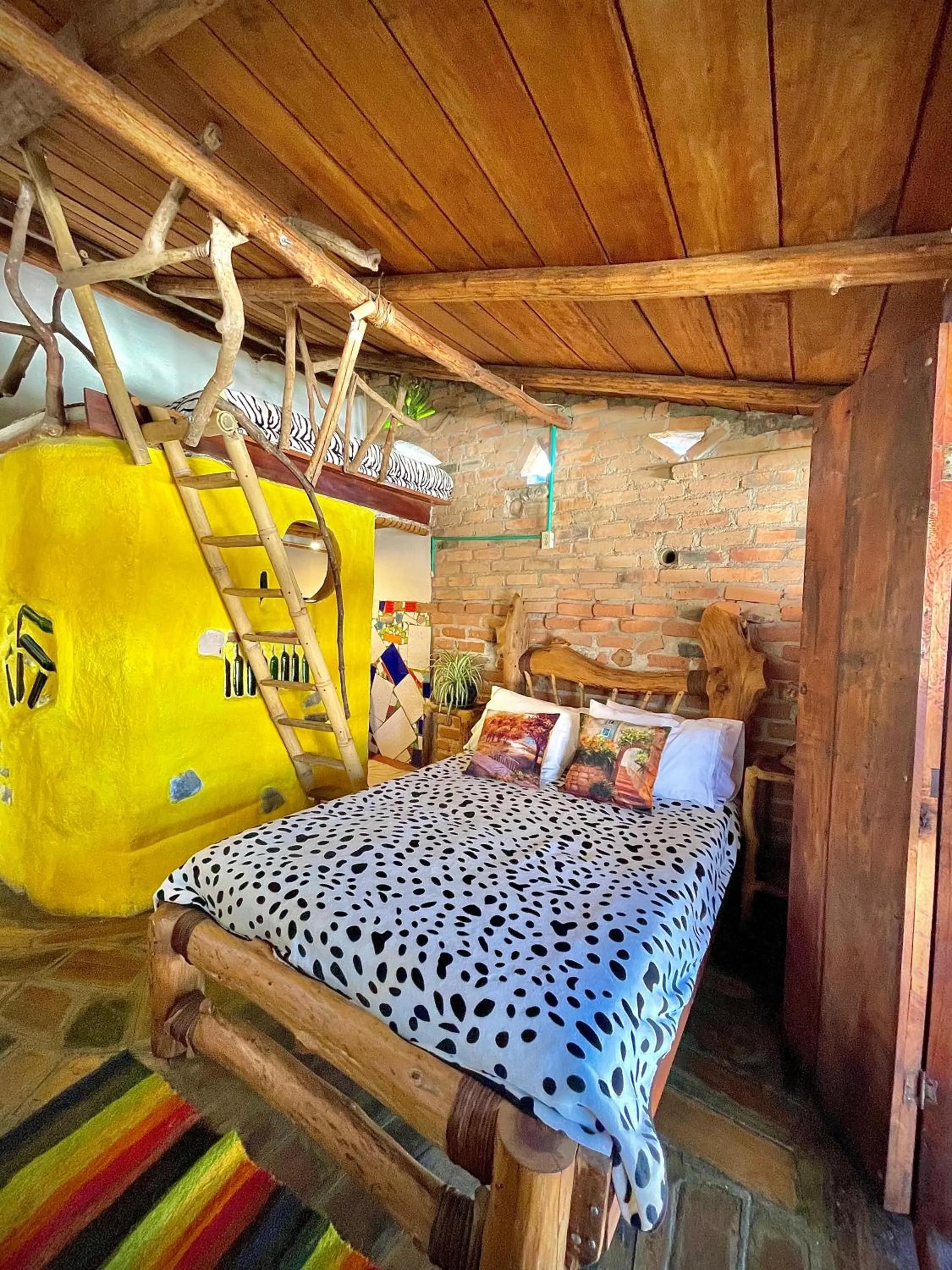 Bed in Hotel Casa Tarzan San Agustin