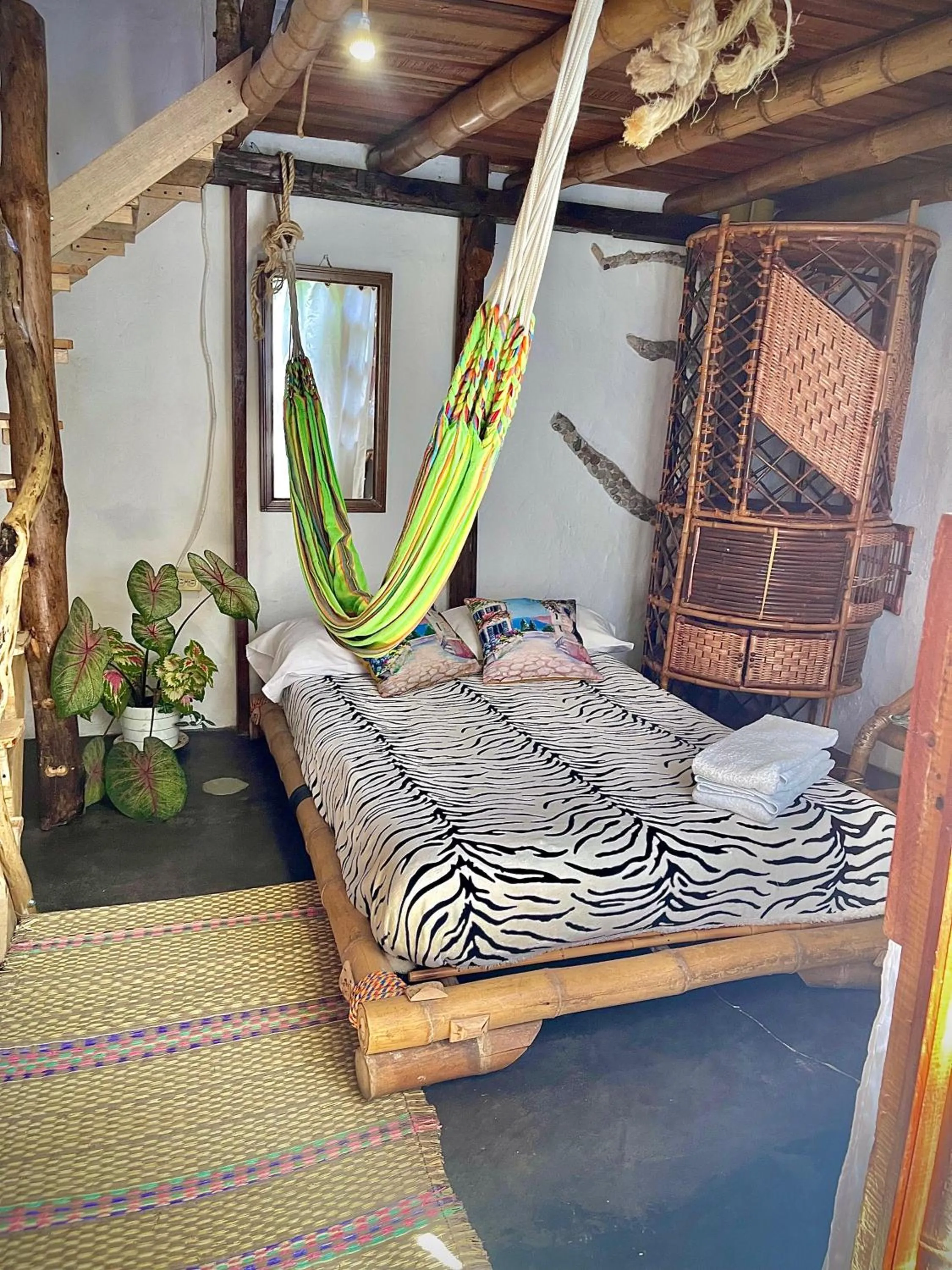 Bed in Hotel Casa Tarzan San Agustin