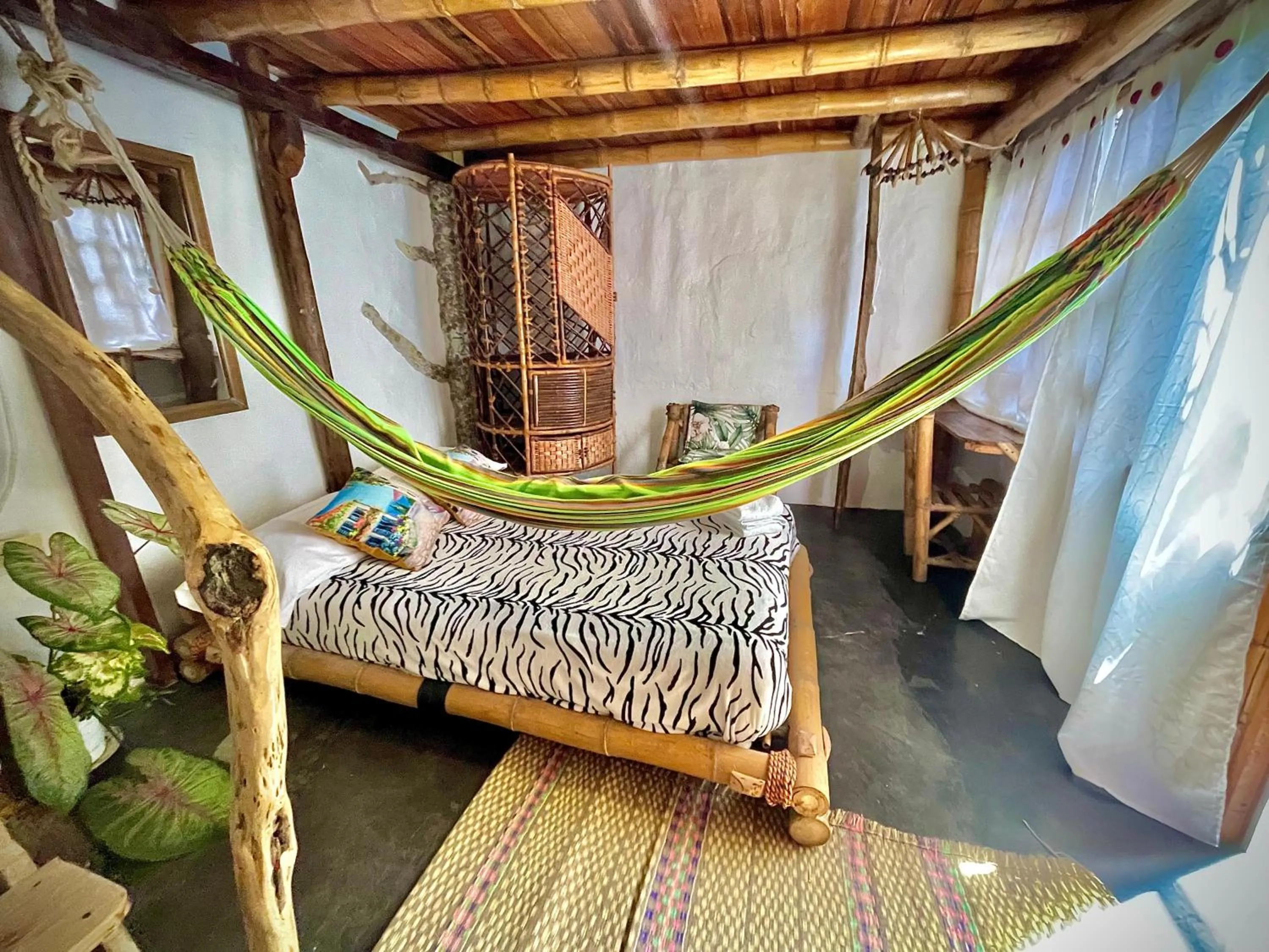 Bed in Hotel Casa Tarzan San Agustin