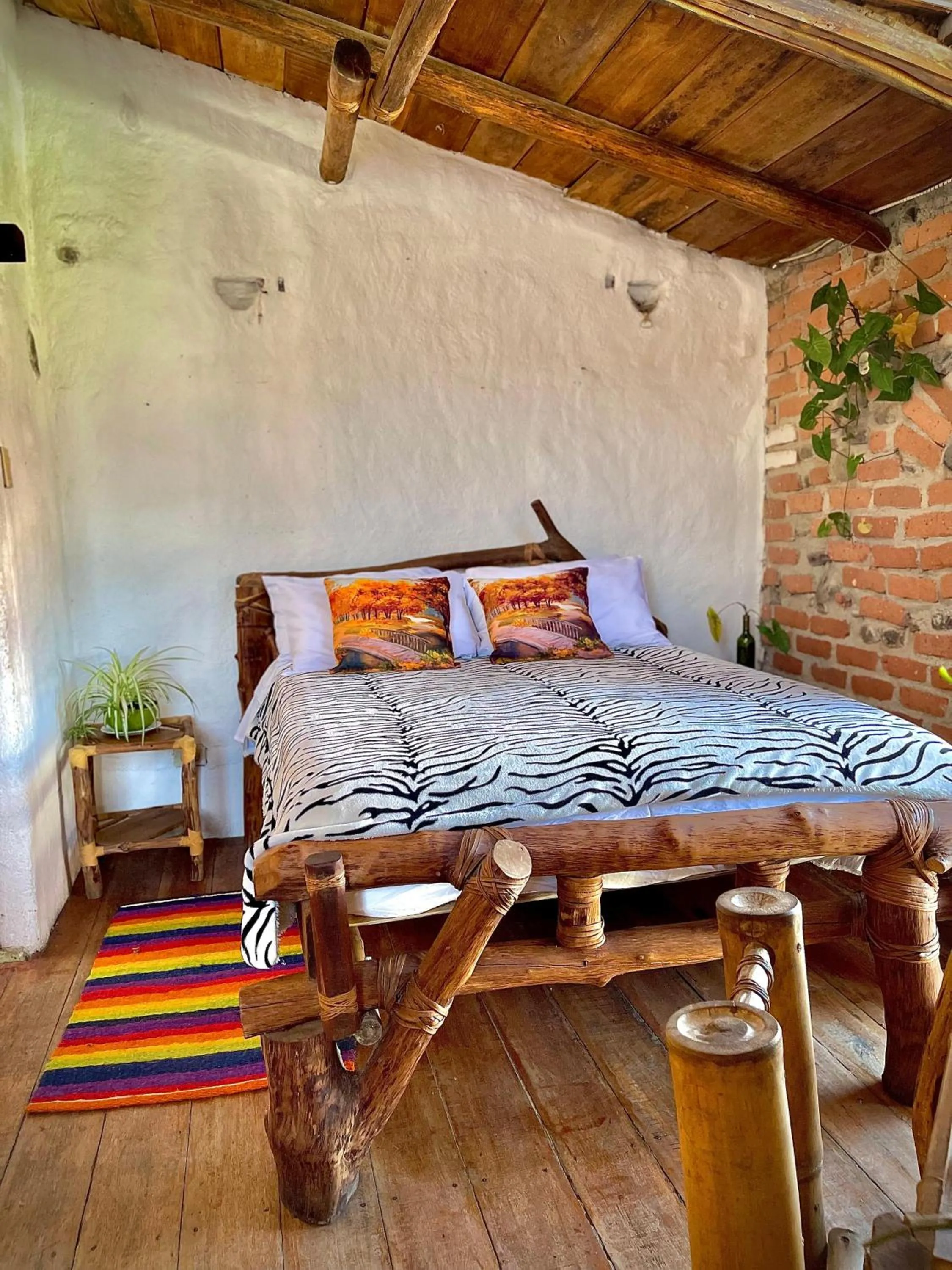 Bed in Hotel Casa Tarzan San Agustin