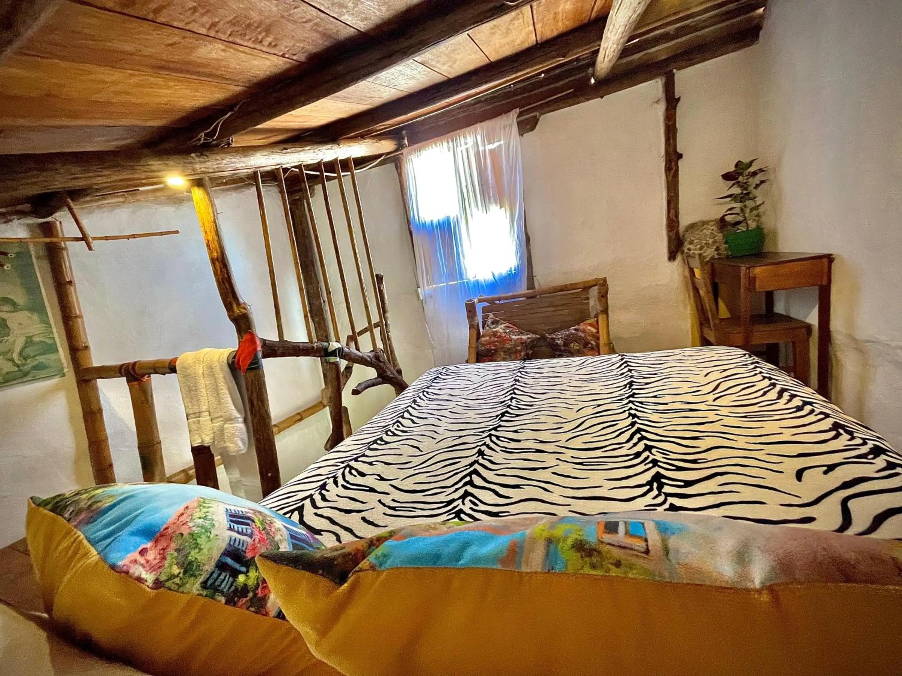 Bed in Hotel Casa Tarzan San Agustin