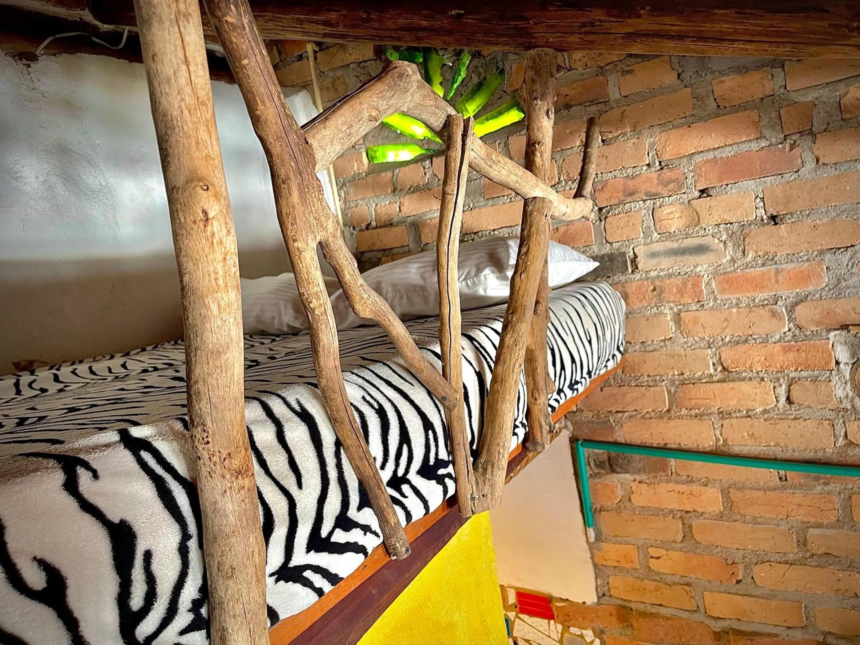 Bed in Hotel Casa Tarzan San Agustin