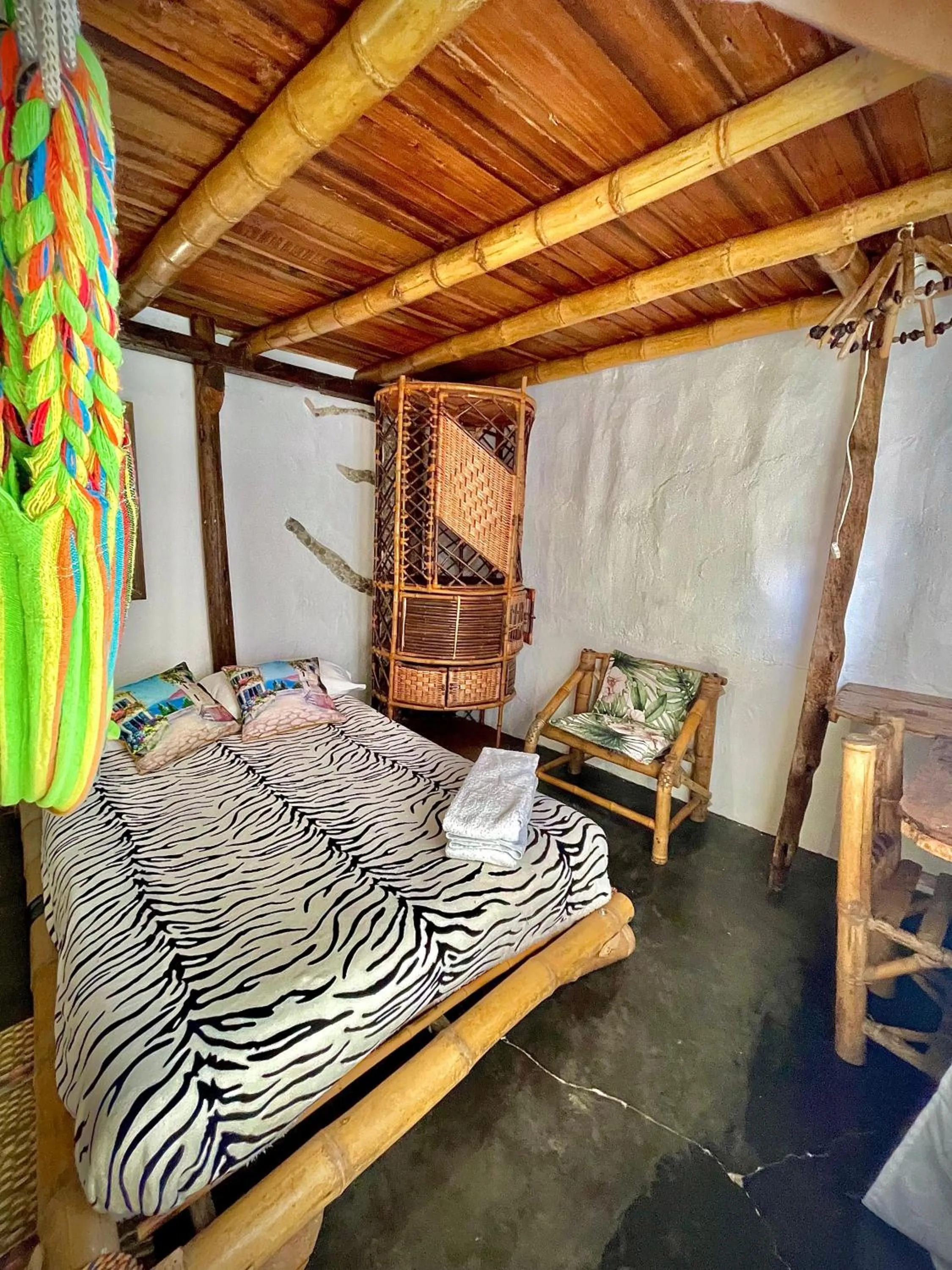 Bed in Hotel Casa Tarzan San Agustin