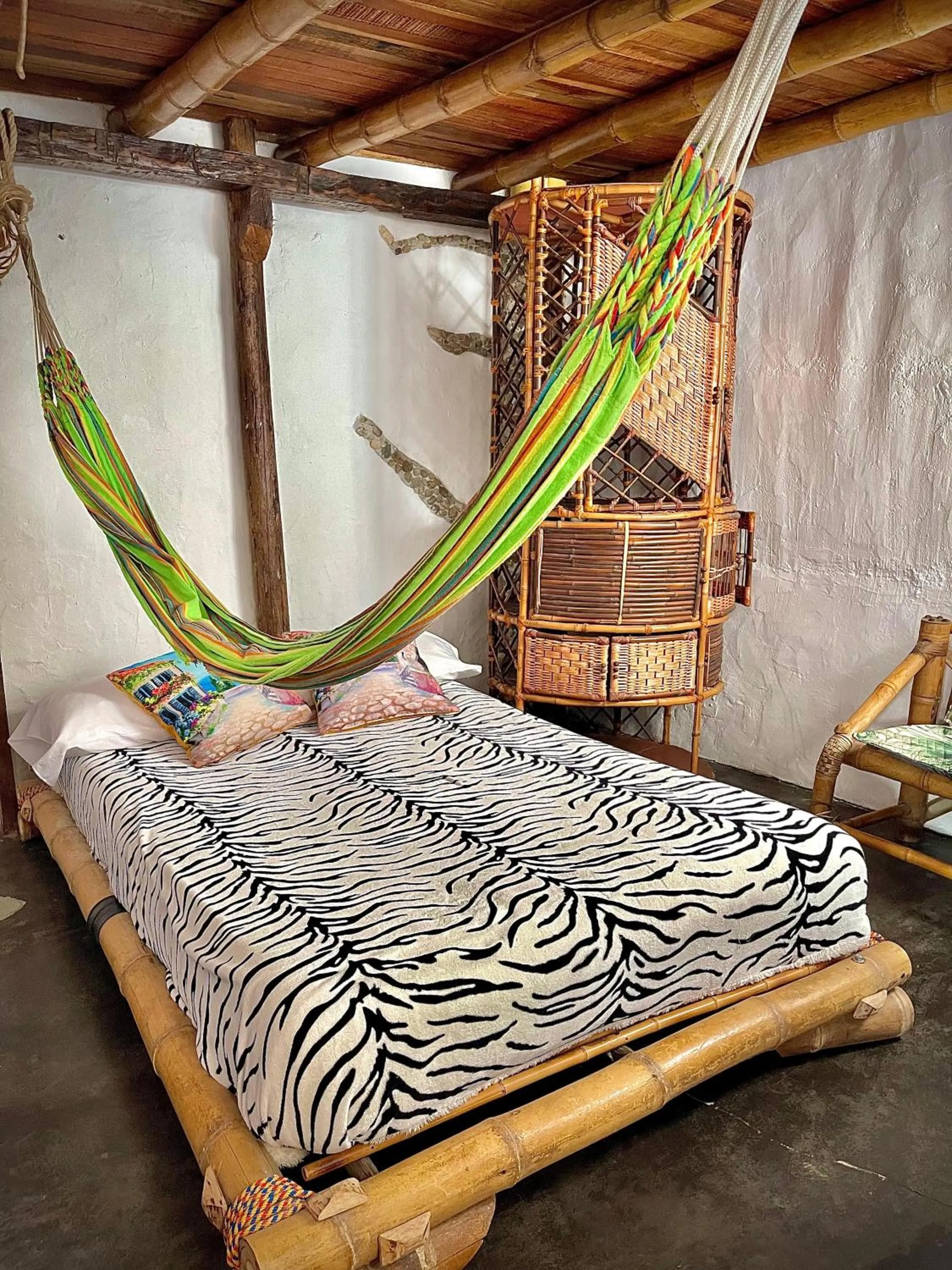 Bed in Hotel Casa Tarzan San Agustin