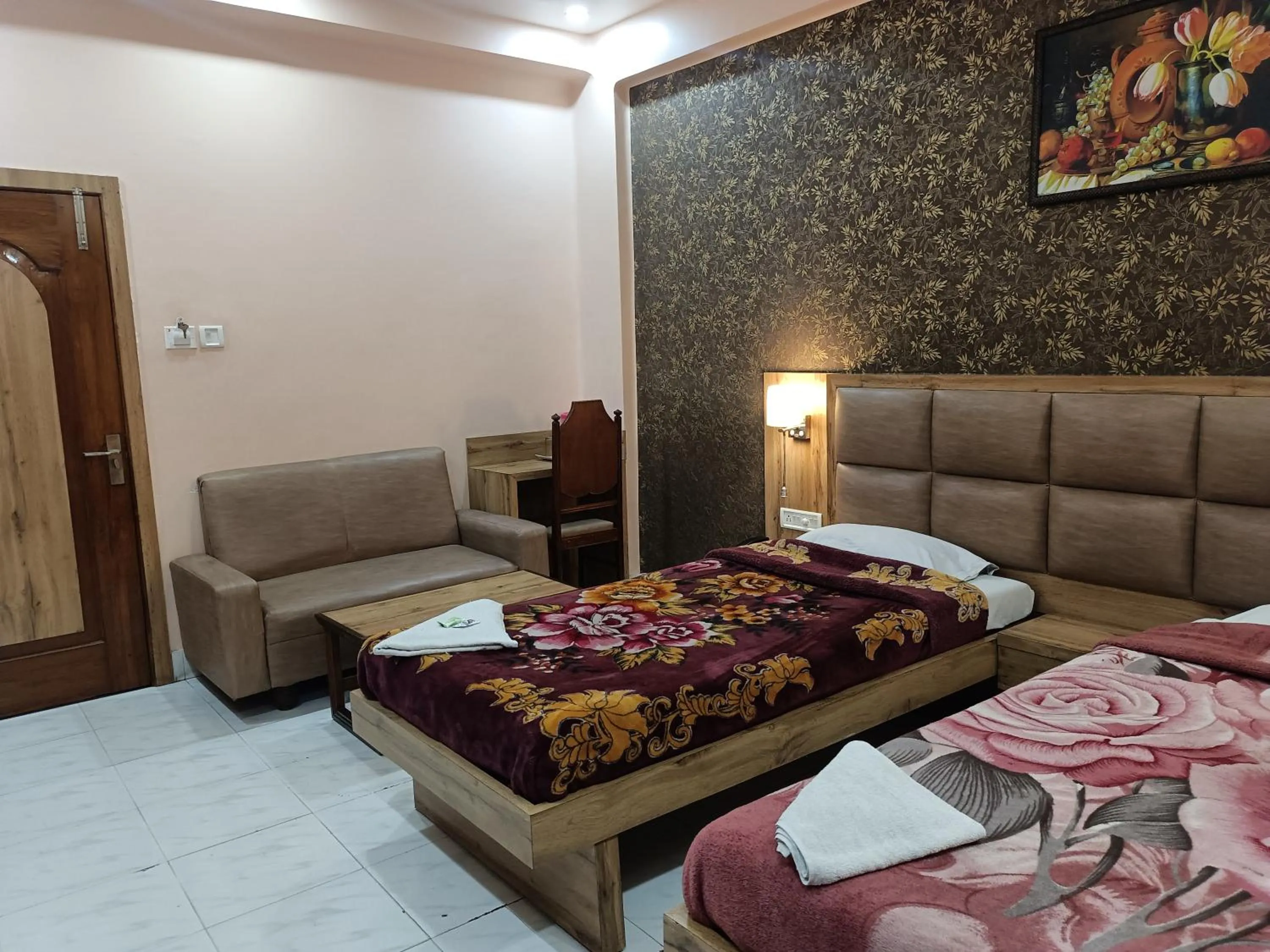 Bed in HOTEL SUDAKSHINA by ROH