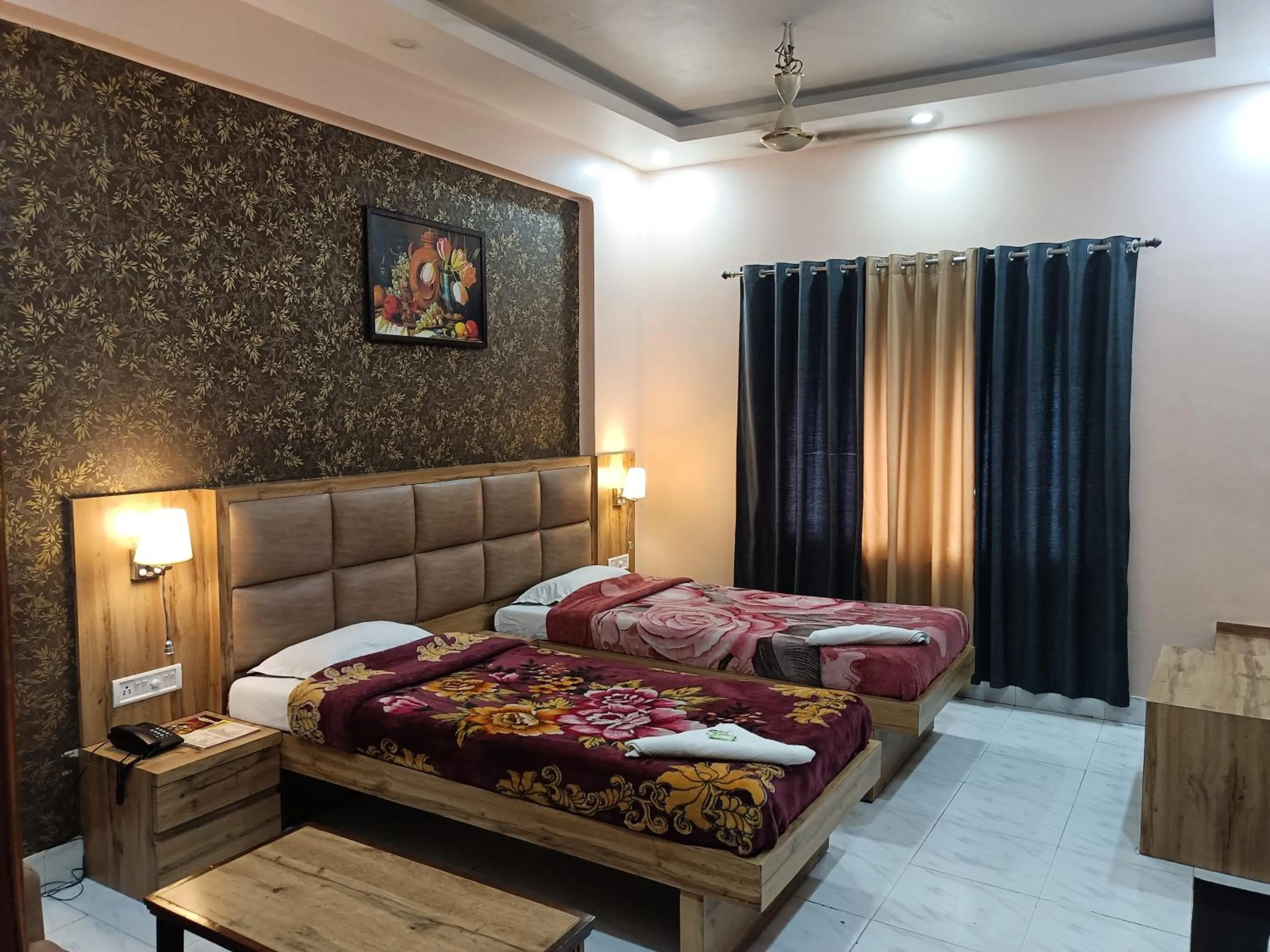 Bed in HOTEL SUDAKSHINA by ROH