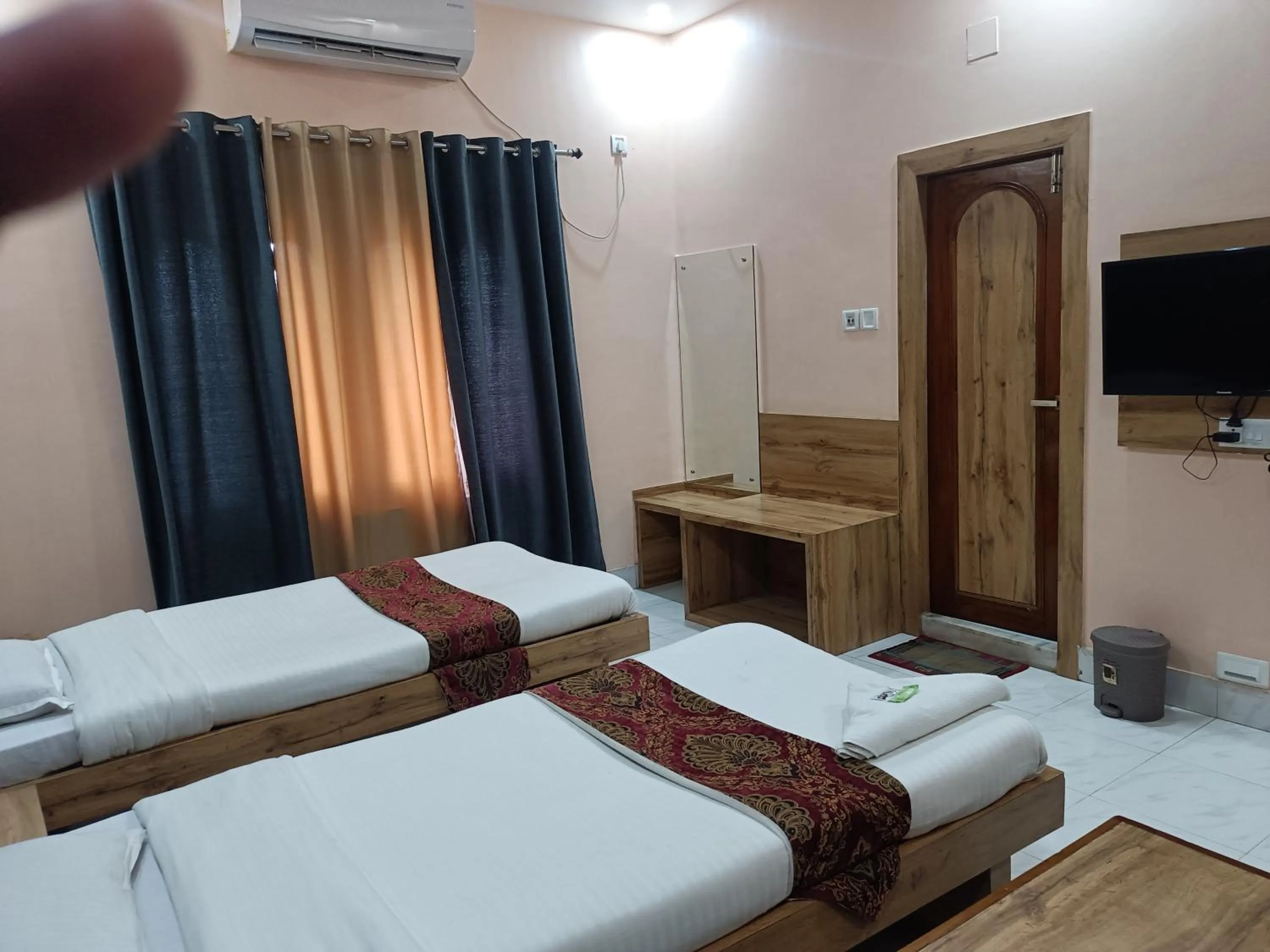 Bed in HOTEL SUDAKSHINA by ROH