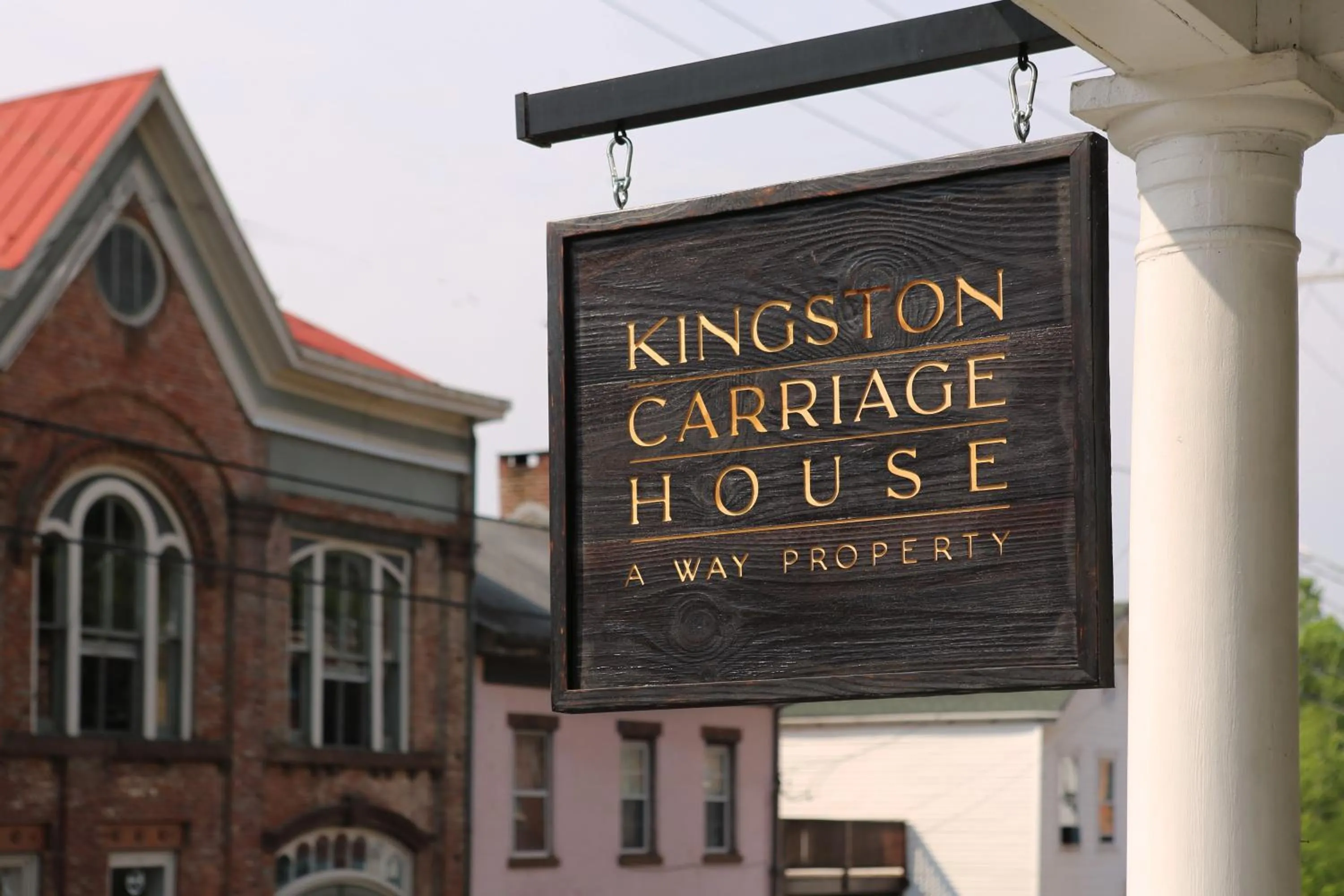 Property logo or sign in KIngston Carriage House
