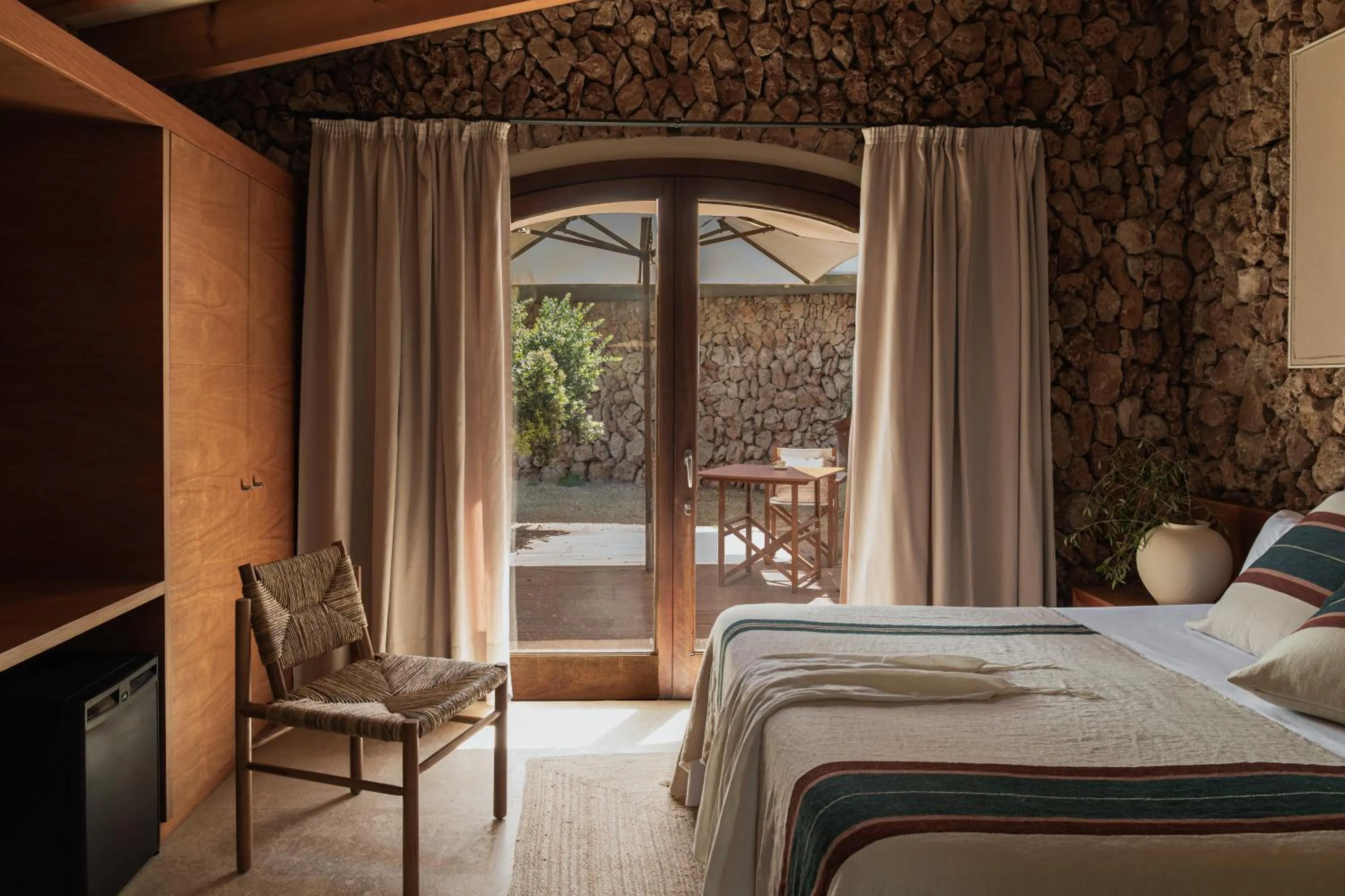 Bed in Binissaida Boutique Hotel