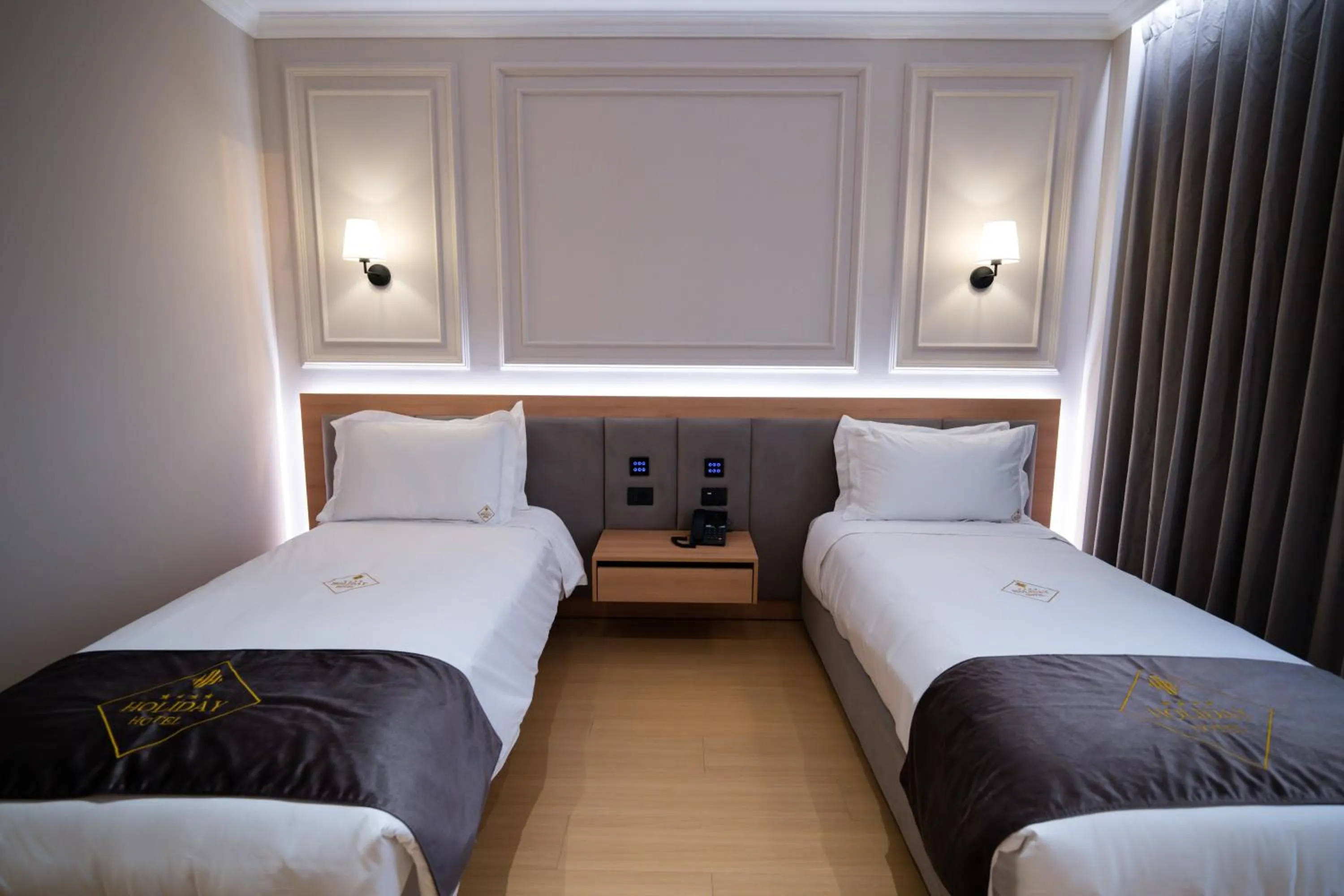 Bed in Holiday Hotel