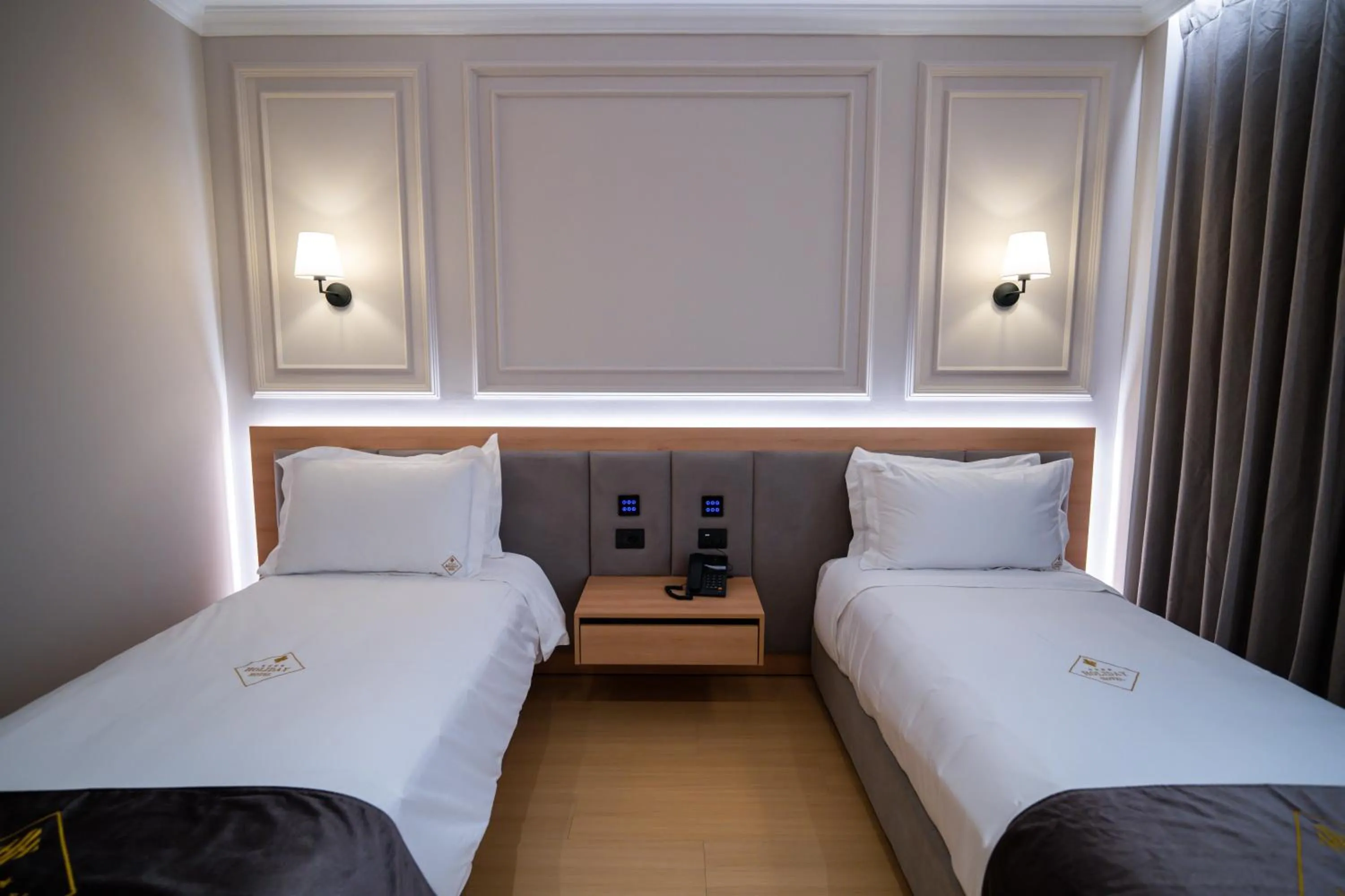 Bed in Holiday Hotel