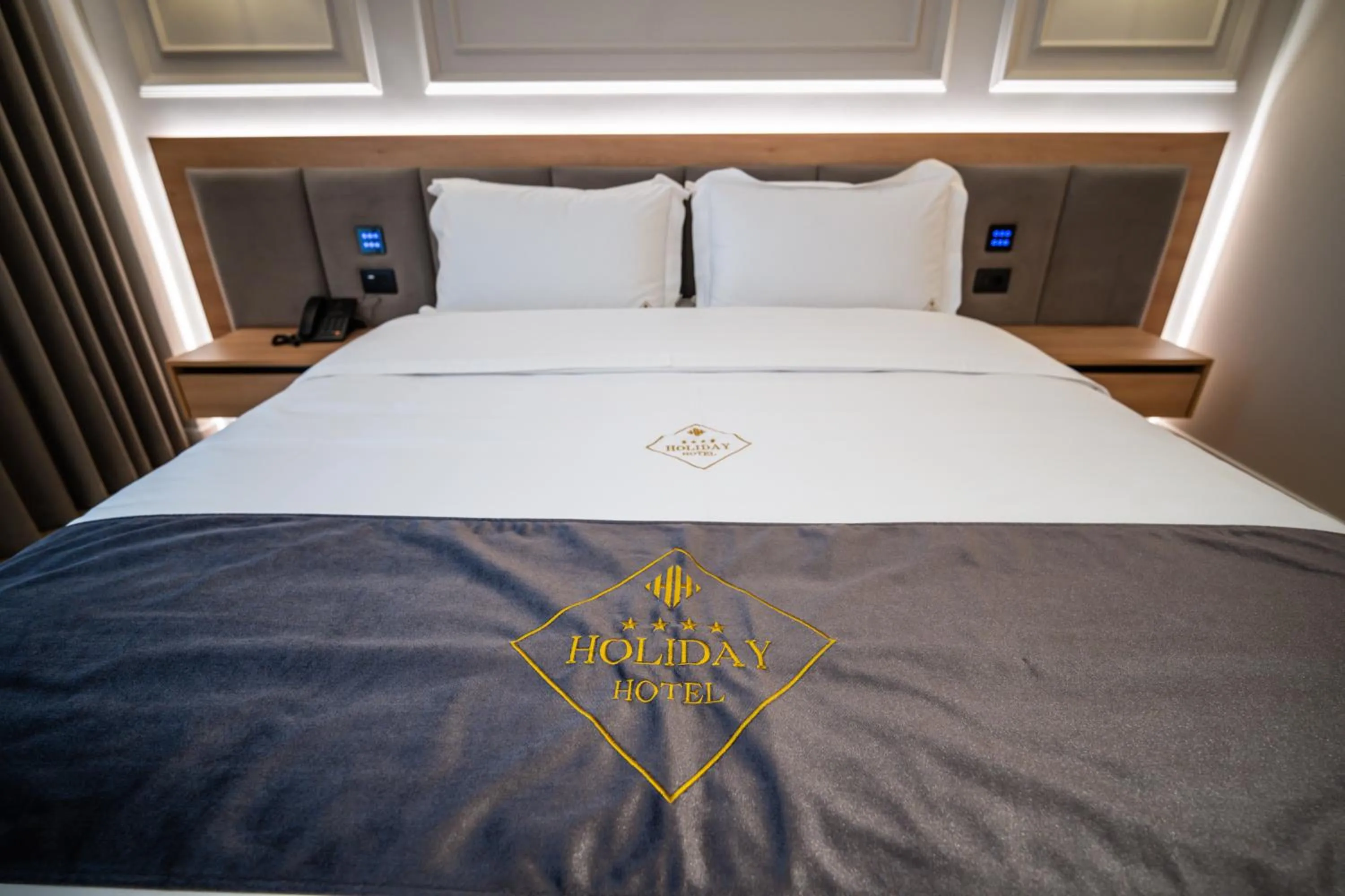 Bed in Holiday Hotel