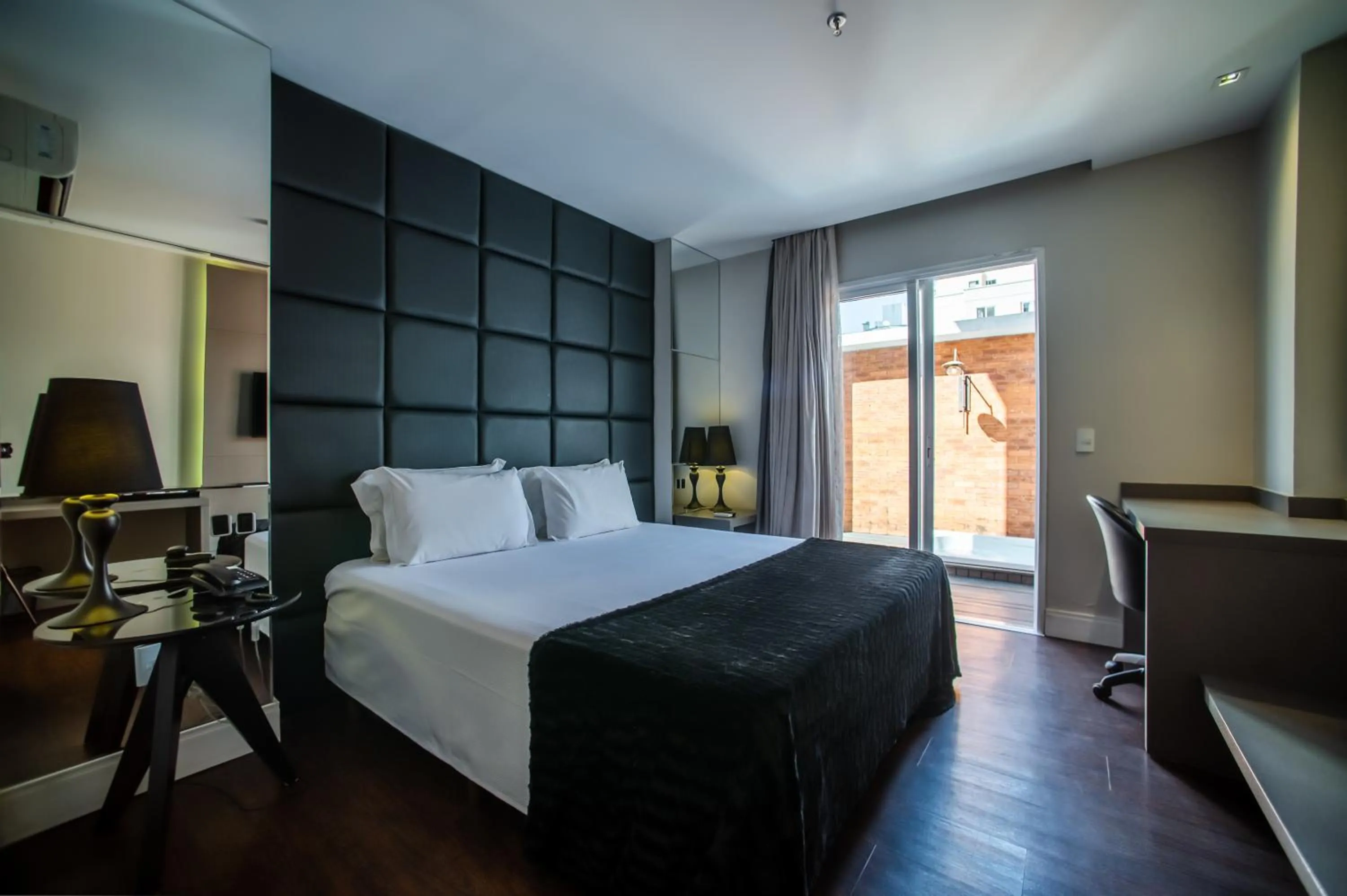 Bed in Brut by Slaviero Hotéis