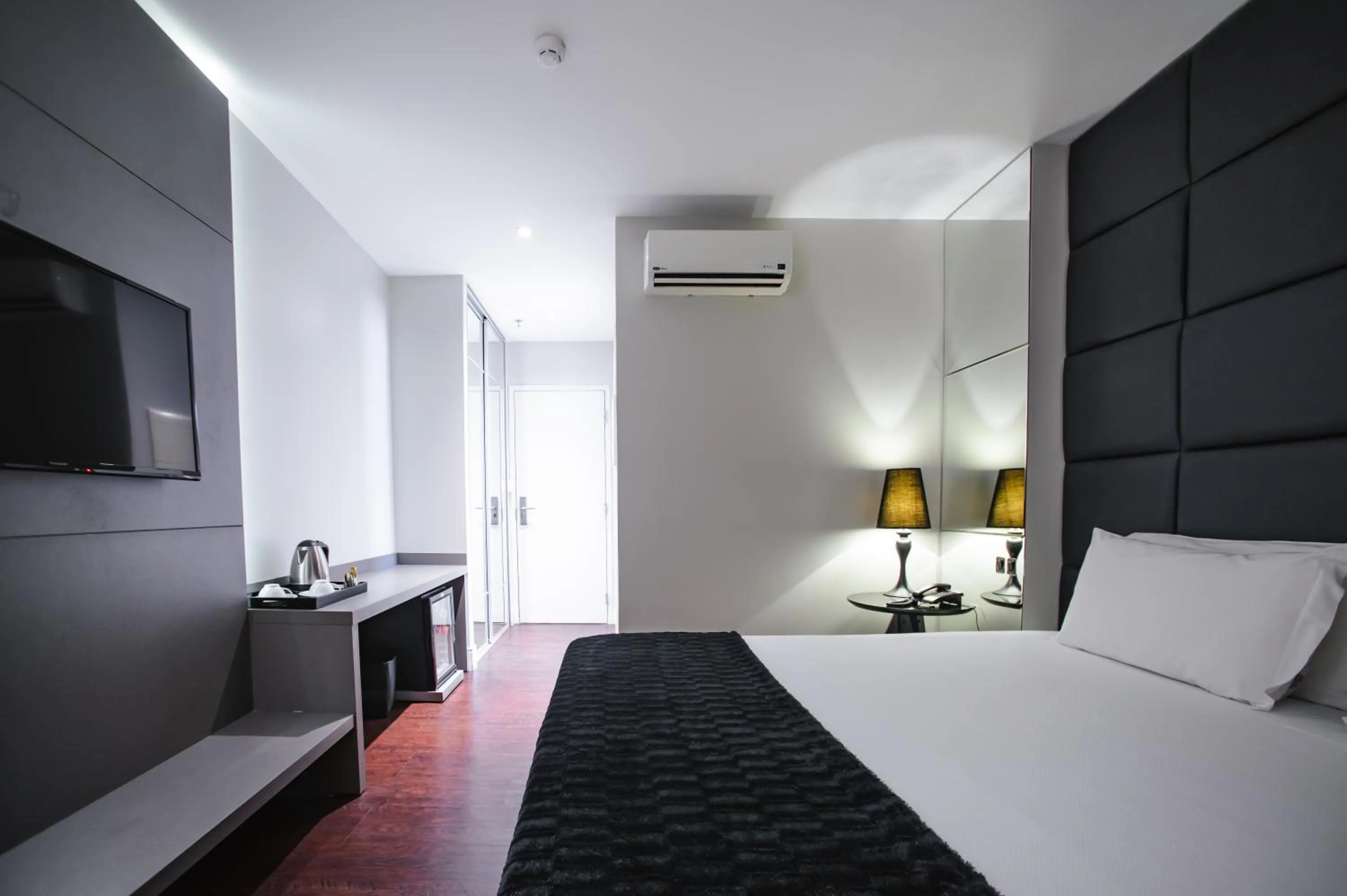 Bed in Brut by Slaviero Hotéis