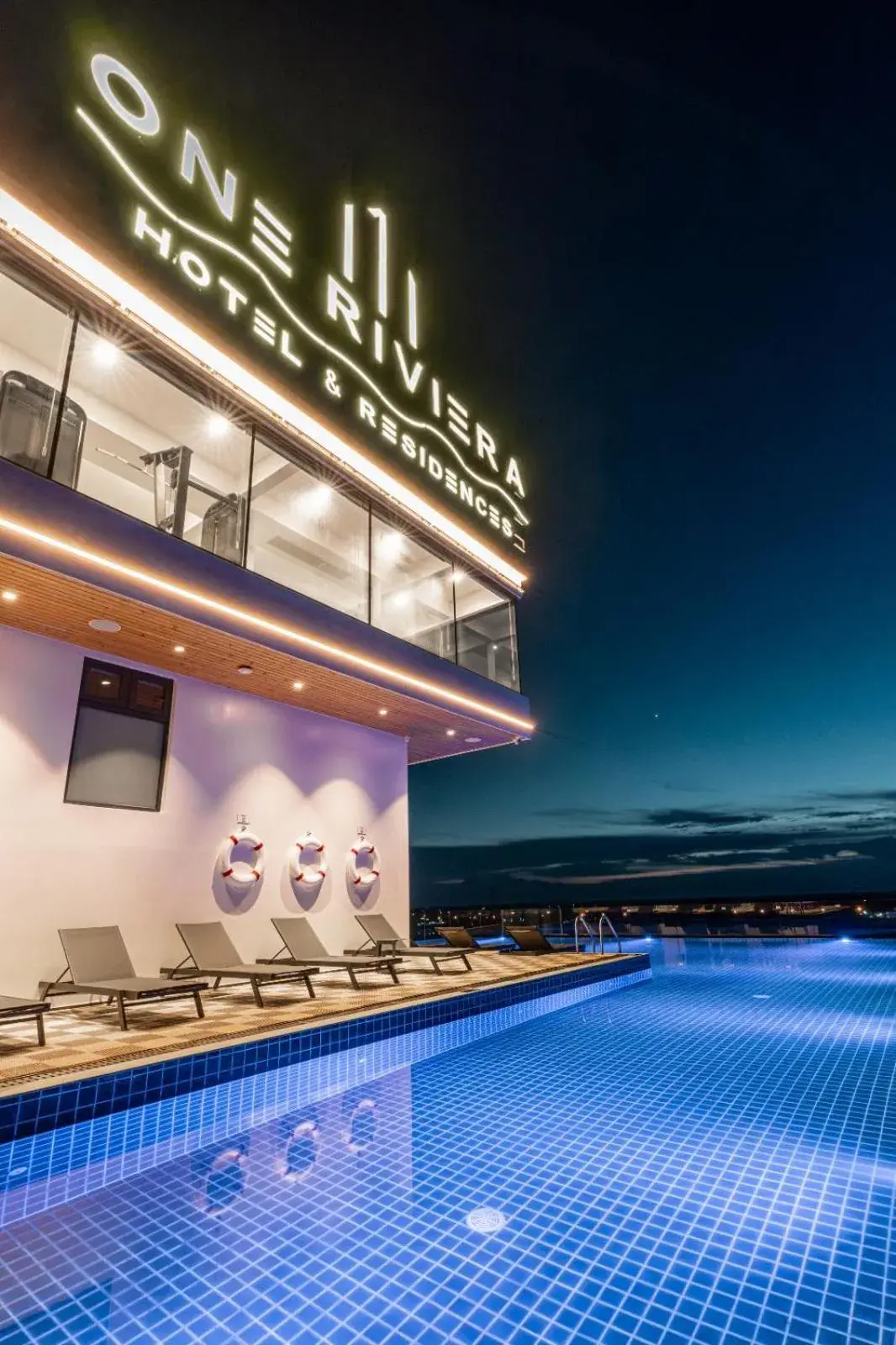 Swimming pool in One Riviera Hotel and Residences Swimming pool in One Riviera Hotel and Residences