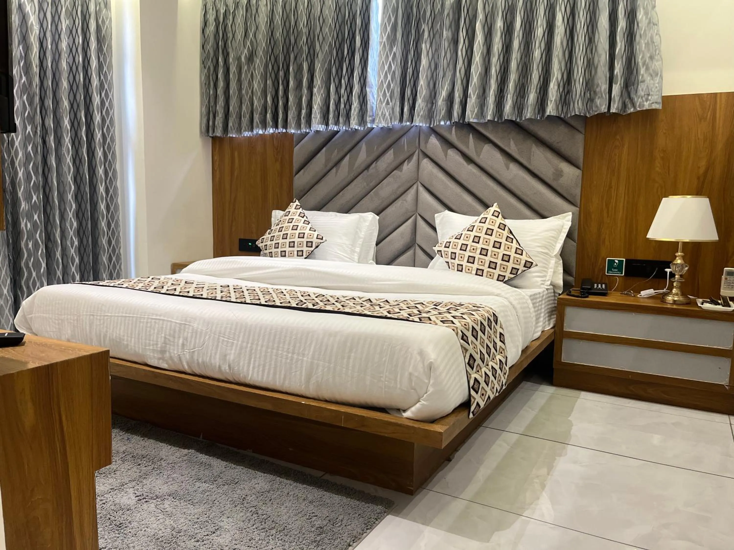 Bed in Hotel Royal Empire