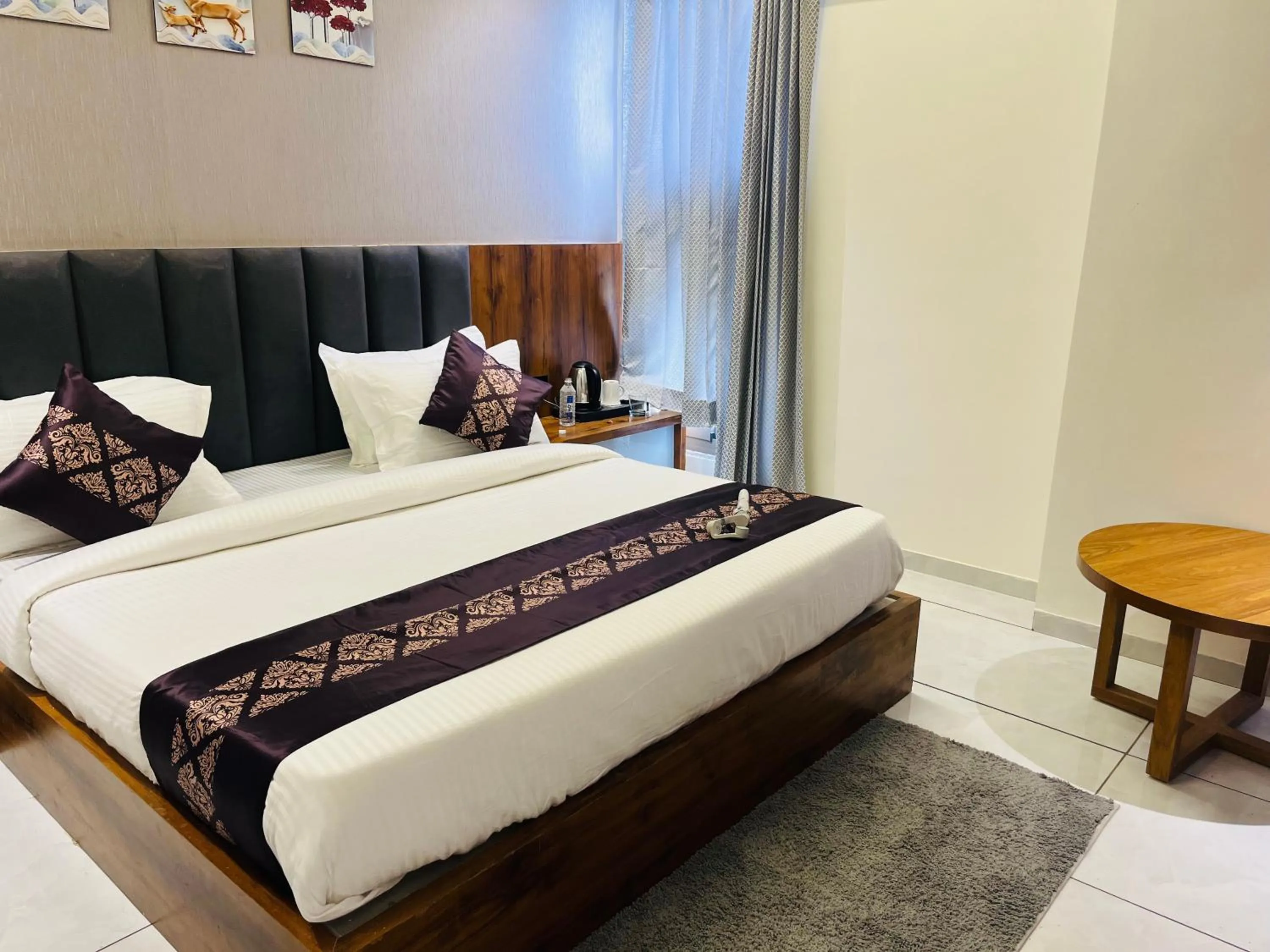 Bed in Hotel Royal Empire