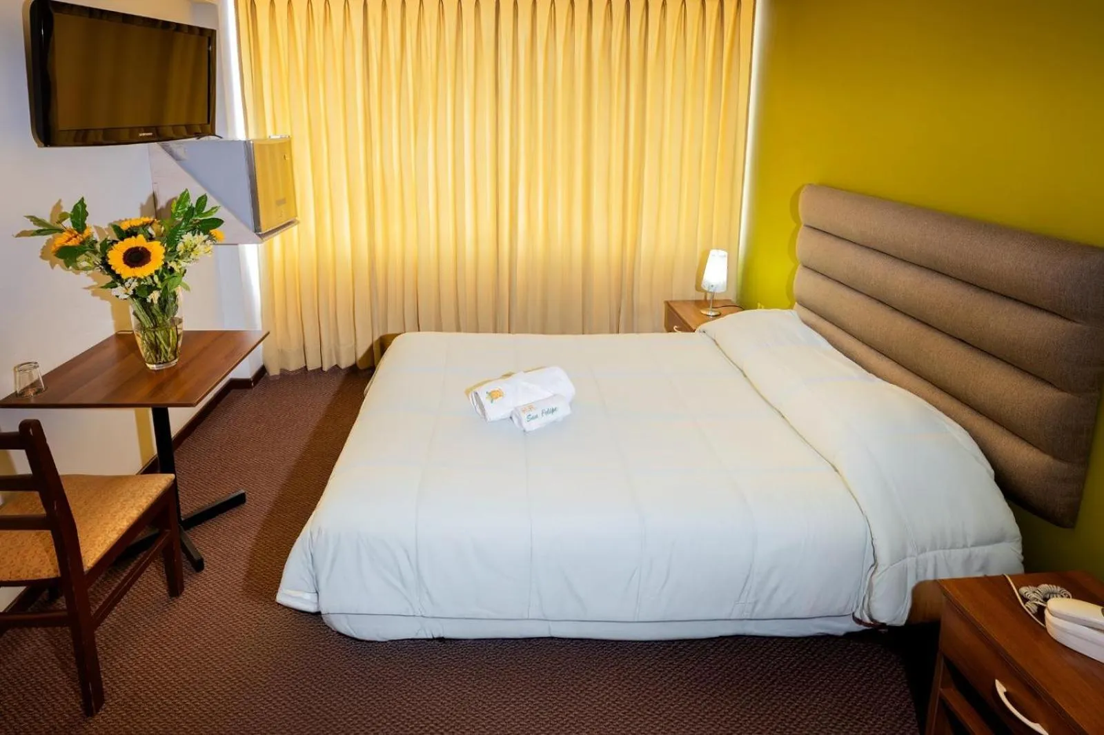 Bed in Hotel San Felipe Suites