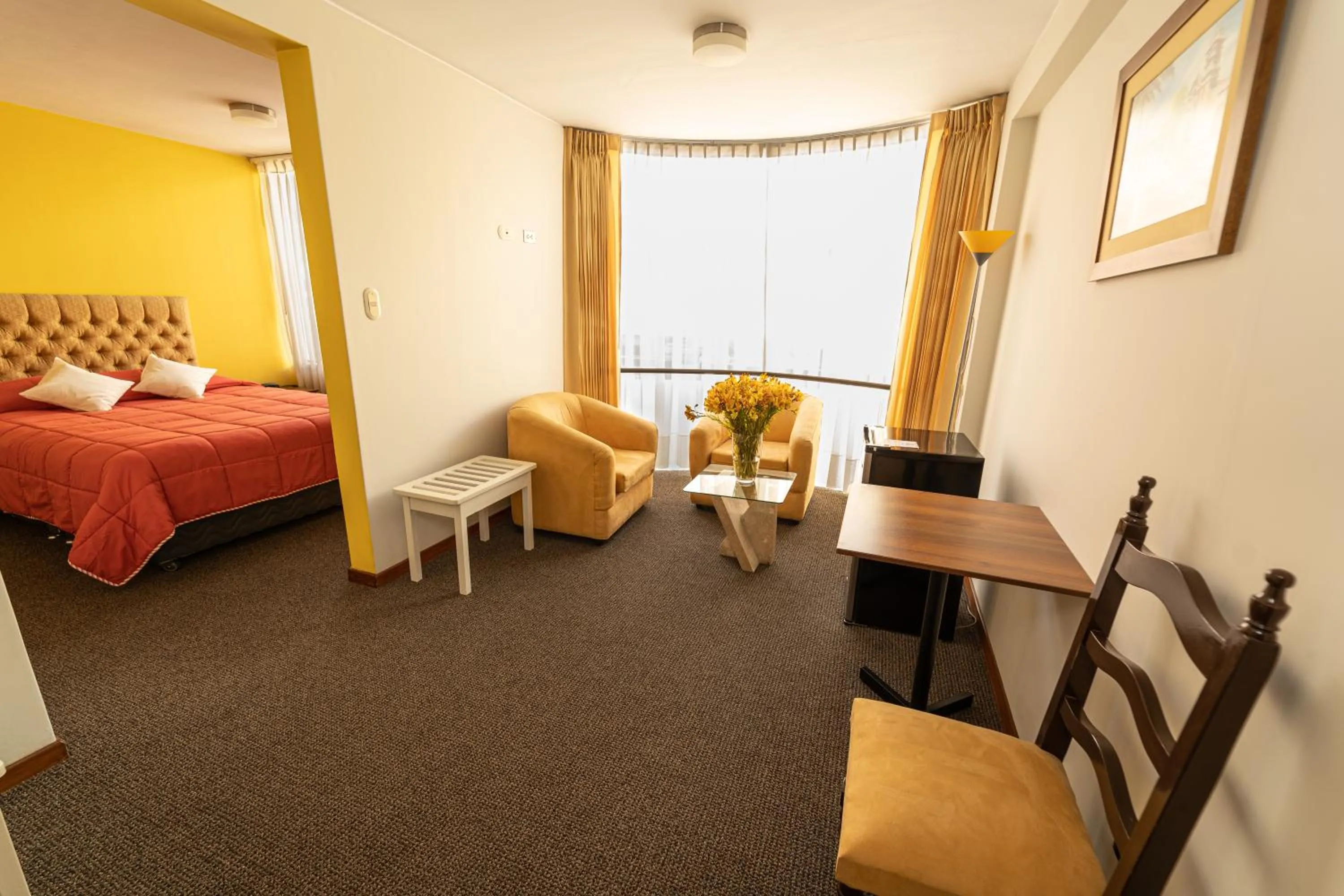 Bed in Hotel San Felipe Suites