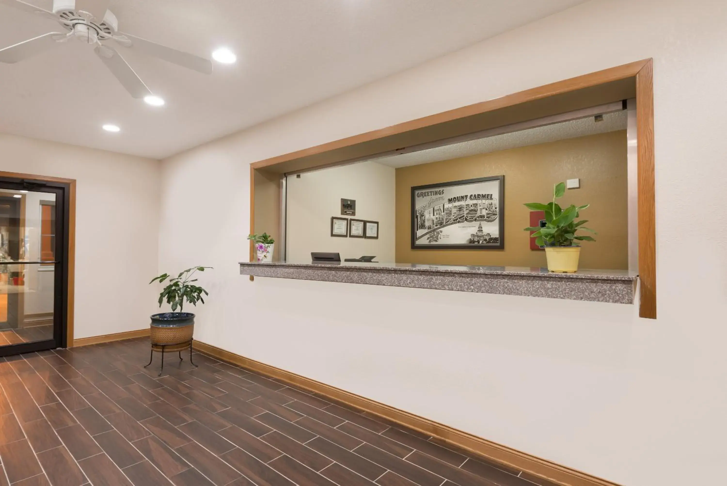 Lobby or reception in Super 8 by Wyndham Mt. Carmel IL Lobby or reception in Super 8 by Wyndham Mt. Carmel IL