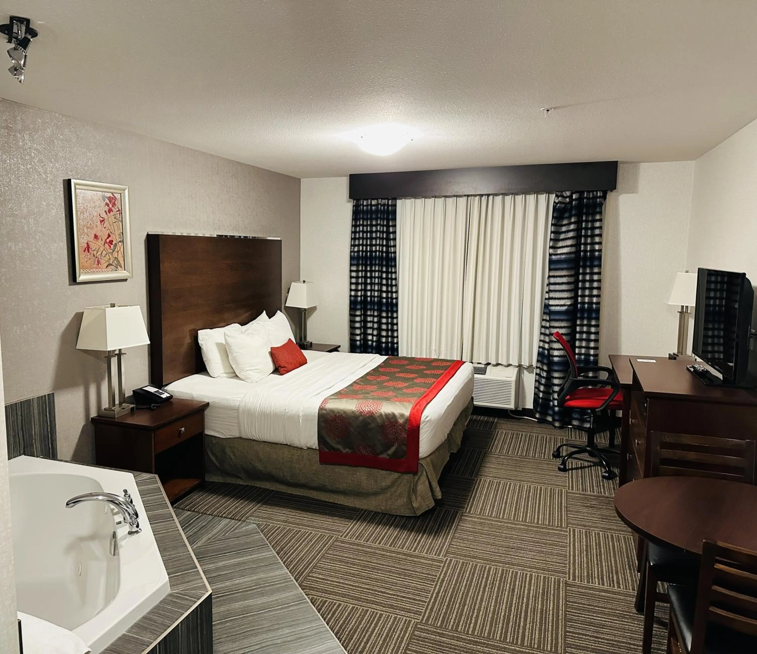 Bed in Ramada by Wyndham Moose Jaw