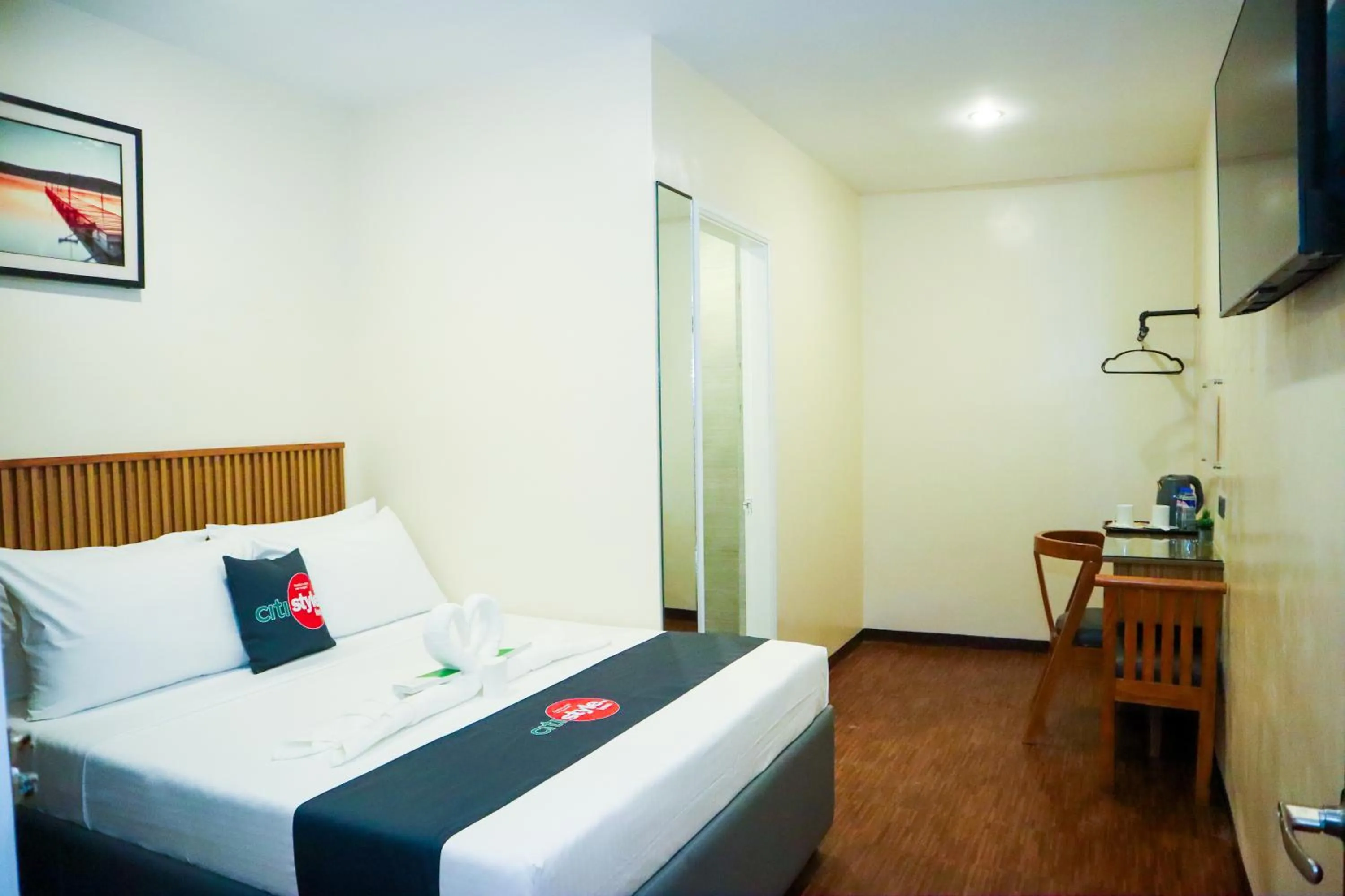 Bed in Citistyle Inn