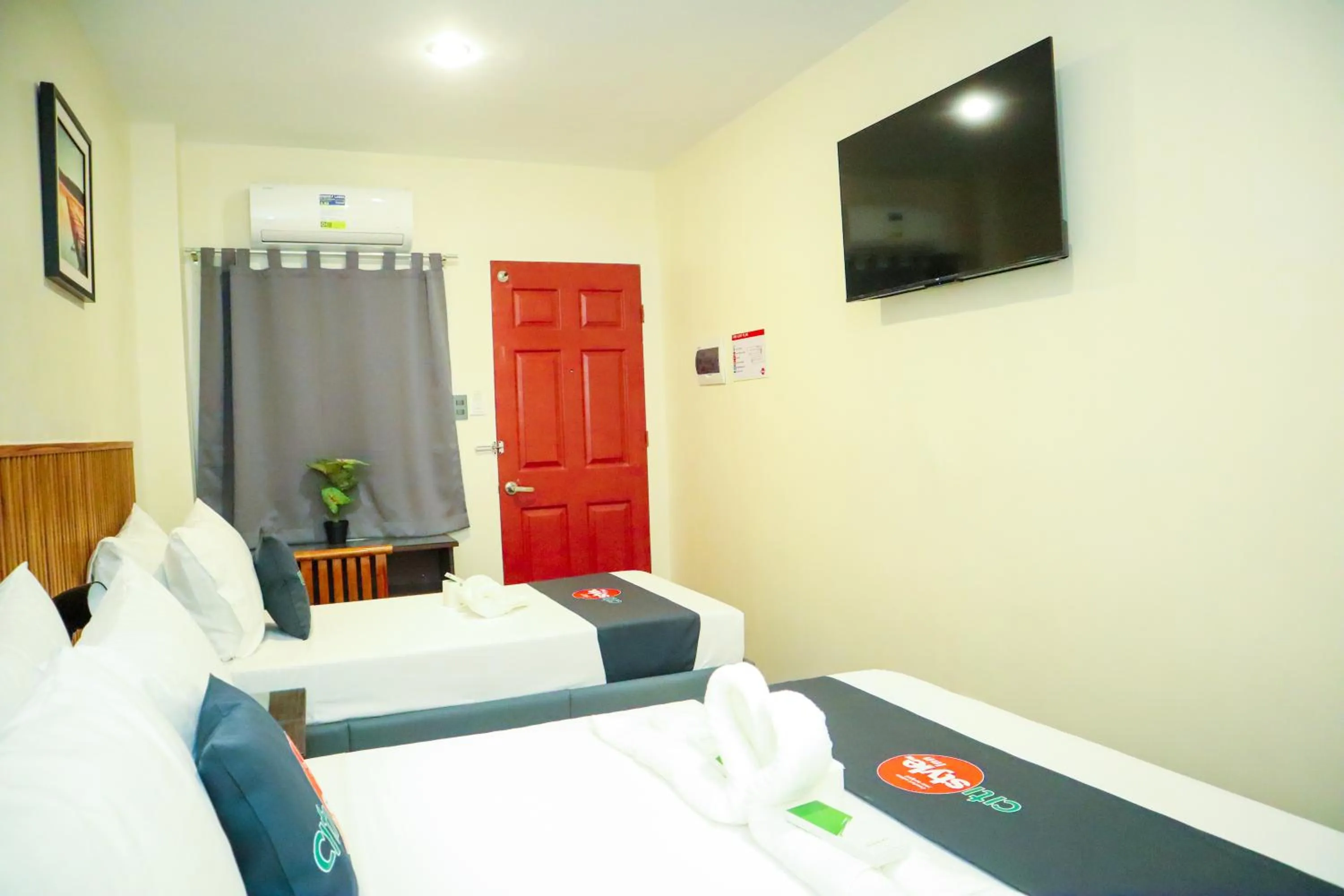 Bed in Citistyle Inn