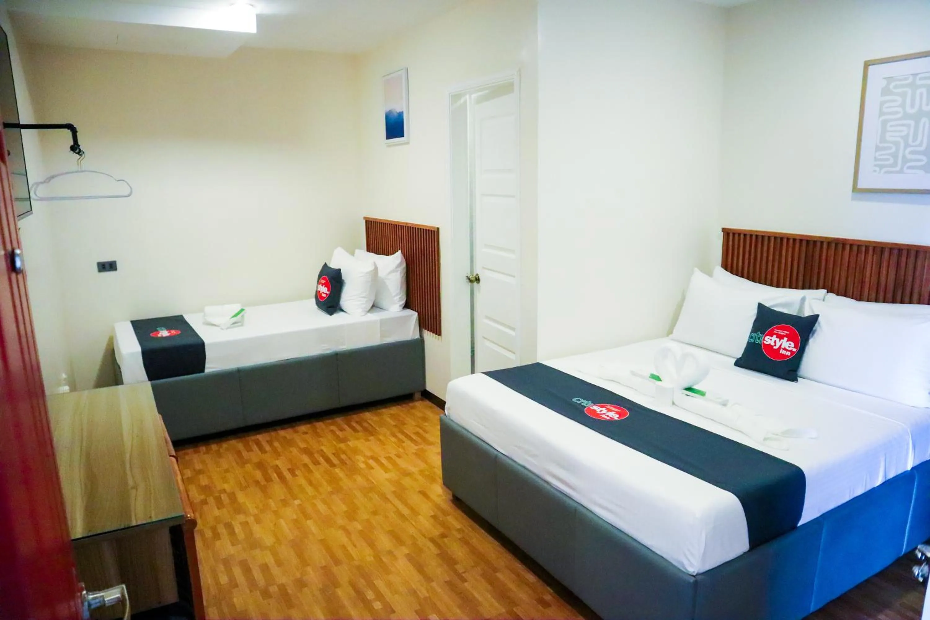 Bed in Citistyle Inn