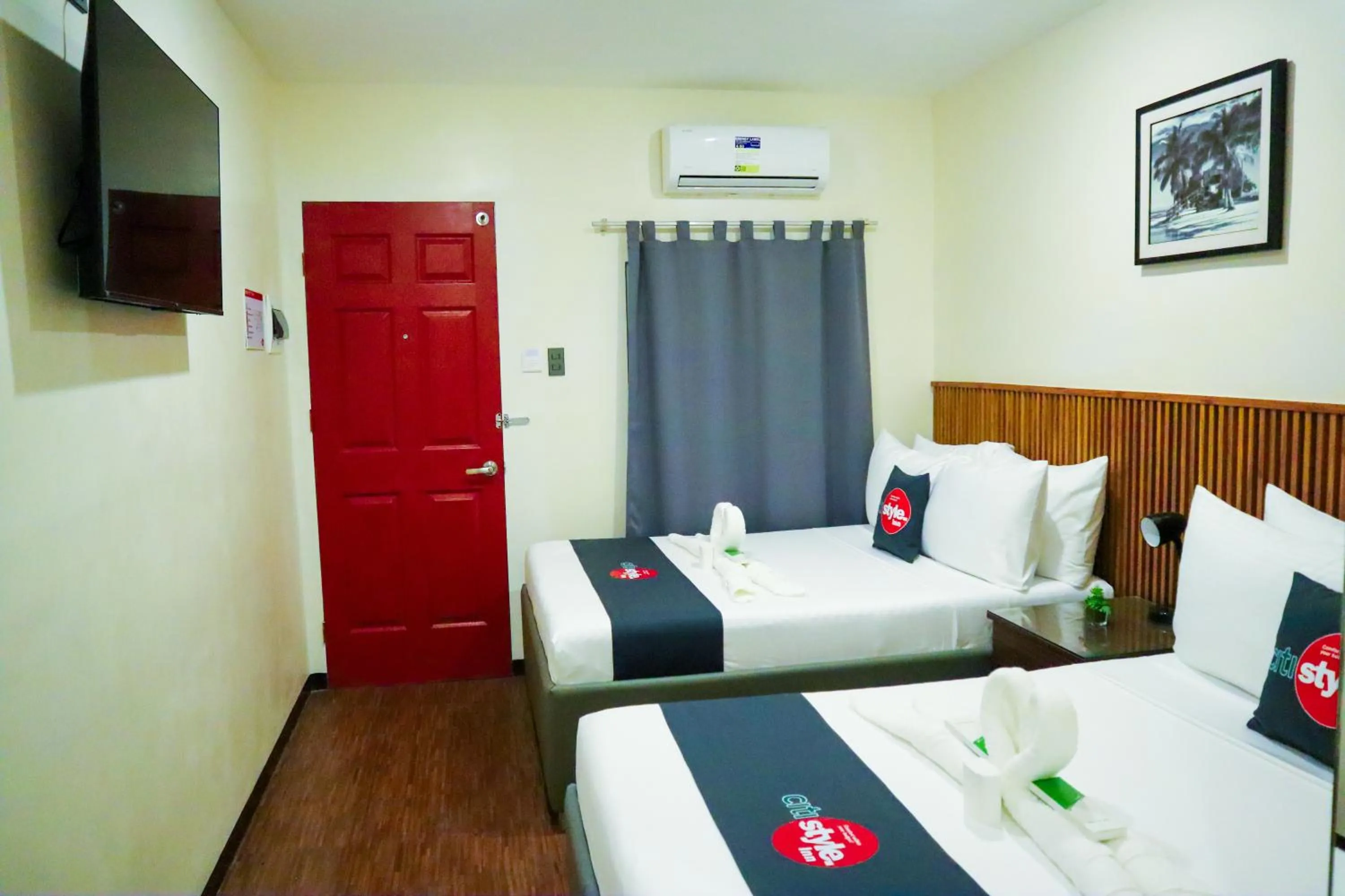 Bed in Citistyle Inn