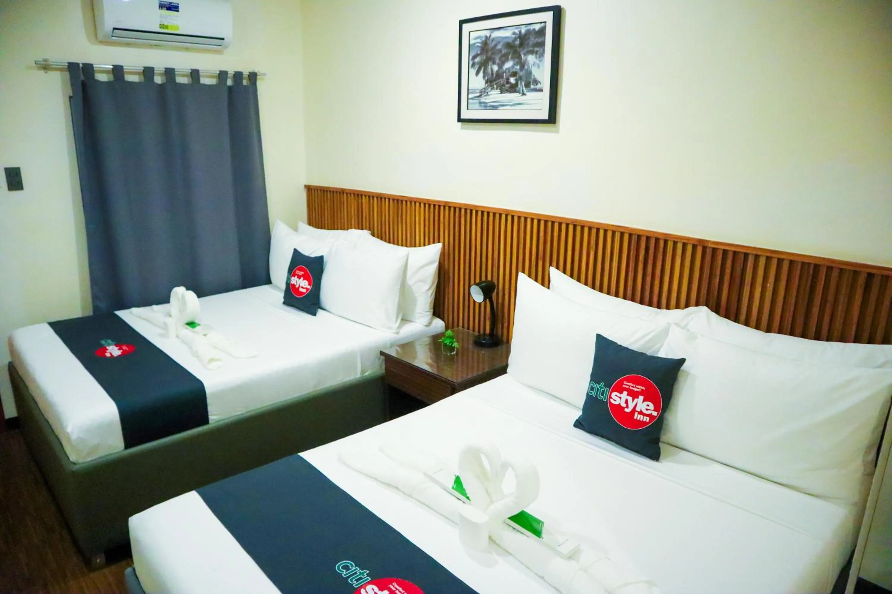 Bed in Citistyle Inn