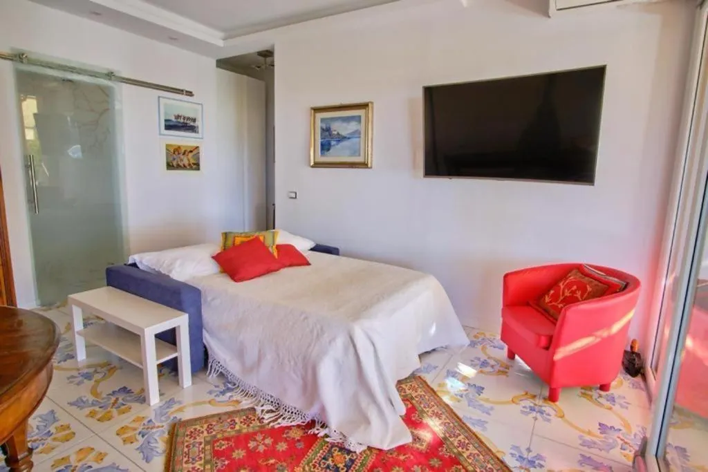 Living room, Bed in Sporthotel Olimpo