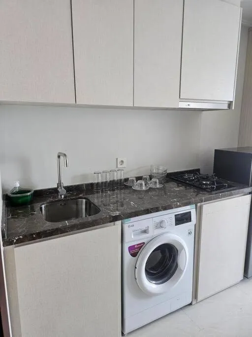 Green Sedayu Apartment Suite by Ellison