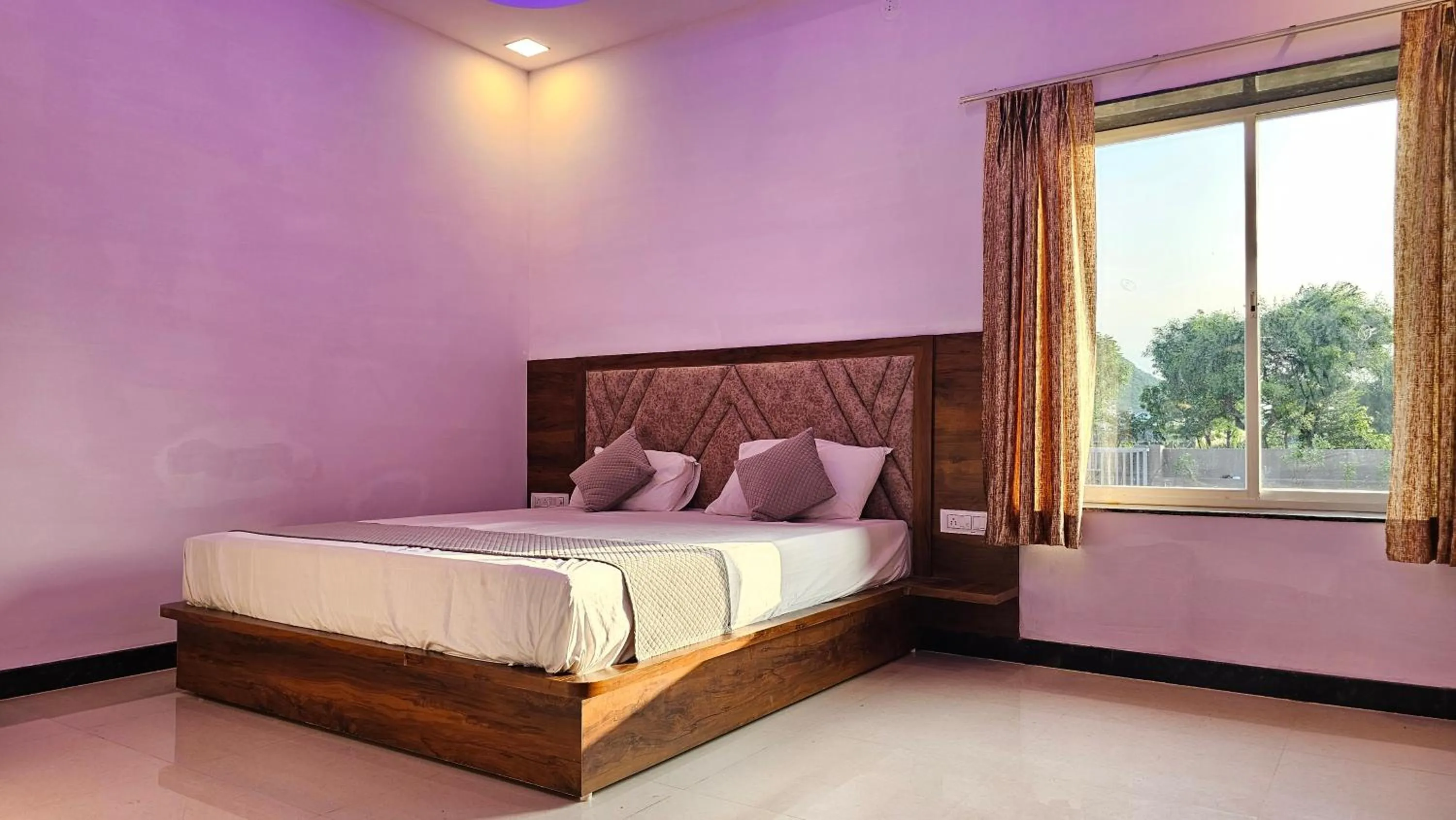 Bed in Braham Vatika Resort