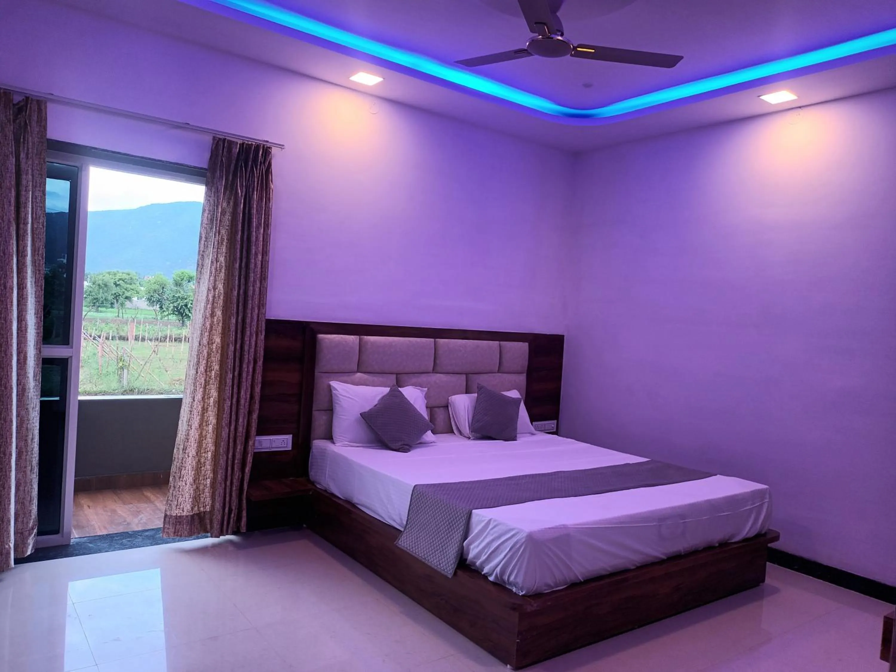 Bed in Braham Vatika Resort