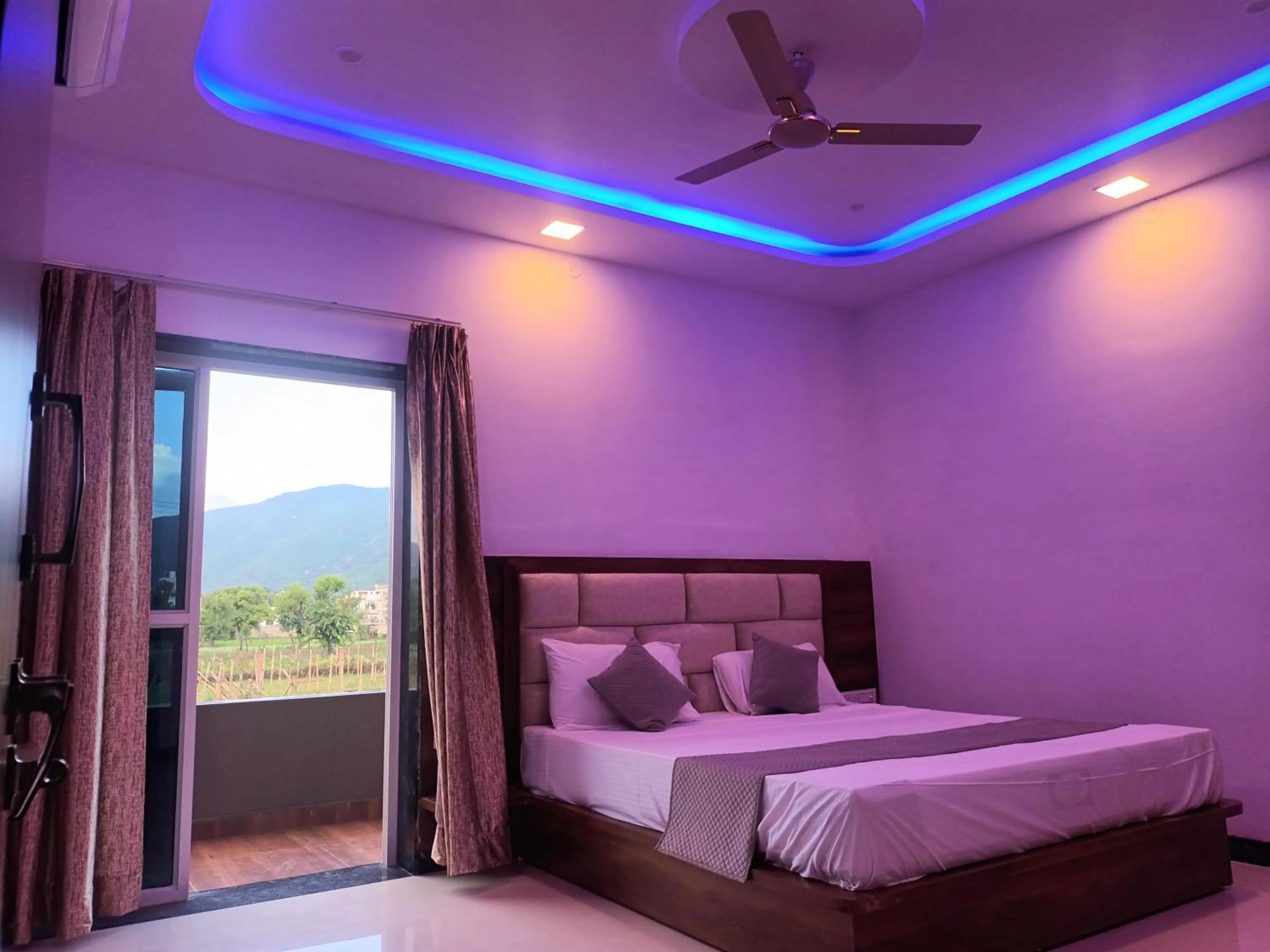 Bed in Braham Vatika Resort