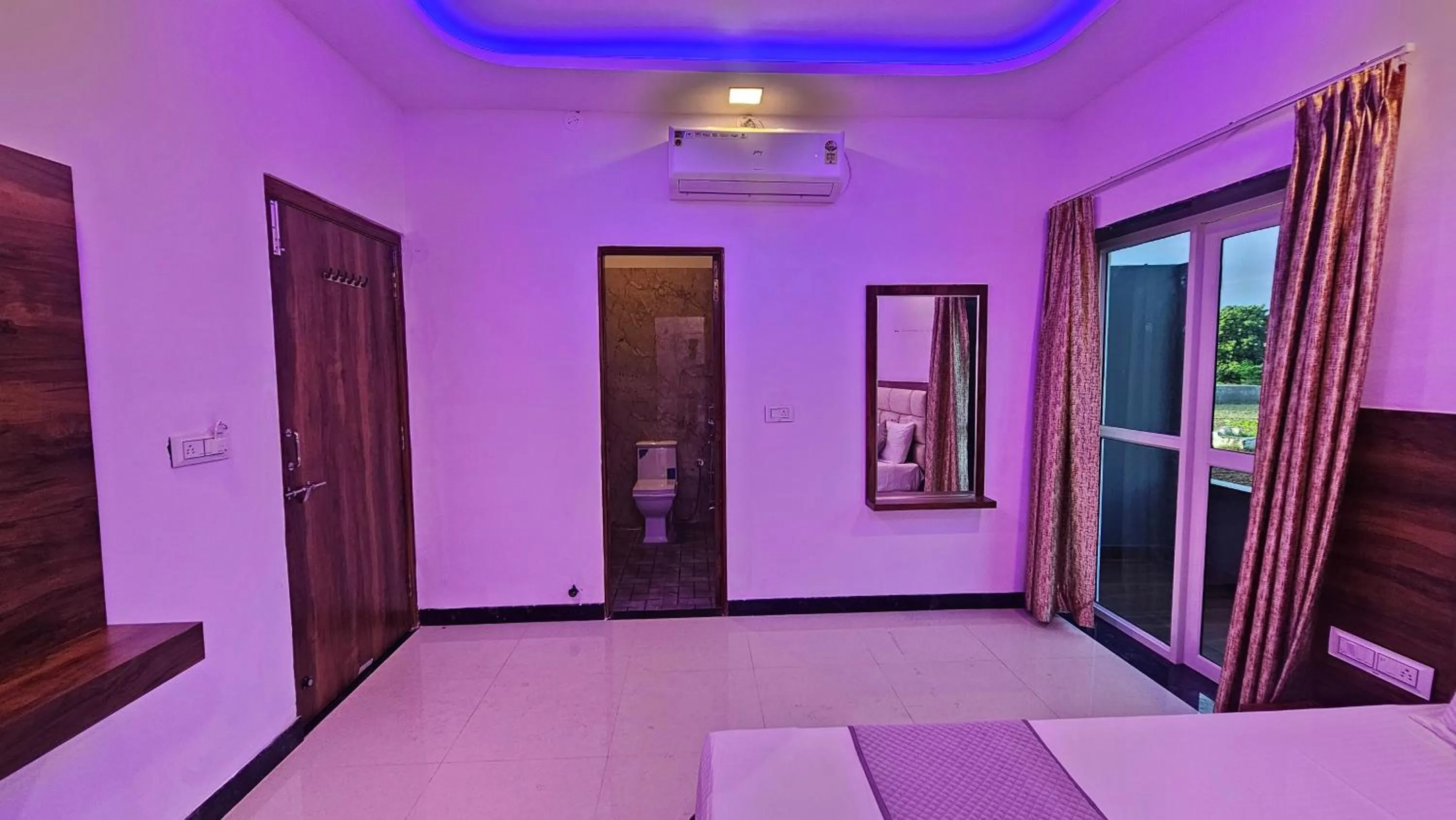 Bed in Braham Vatika Resort