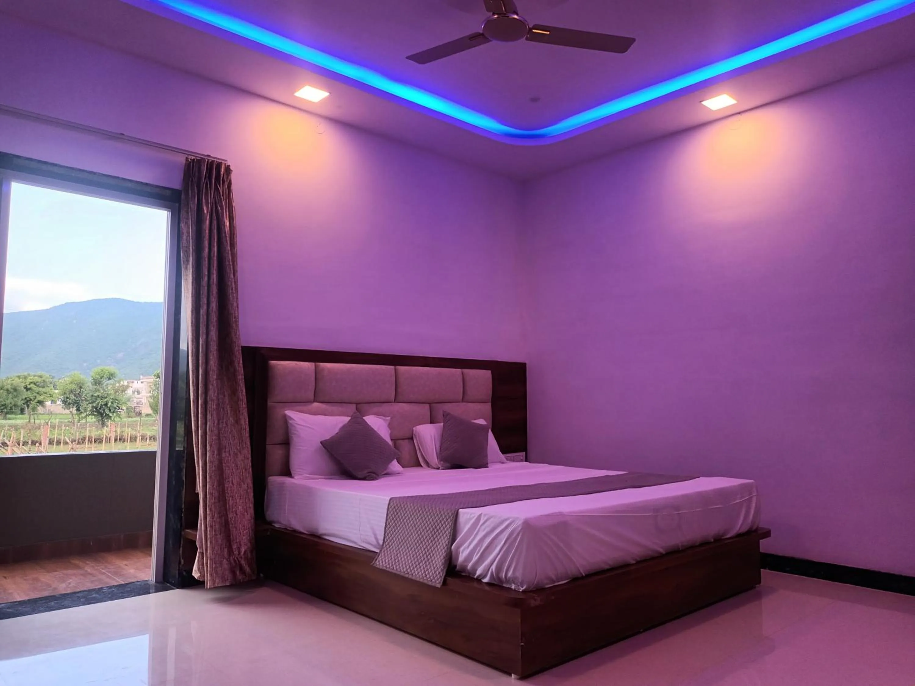 Bed in Braham Vatika Resort