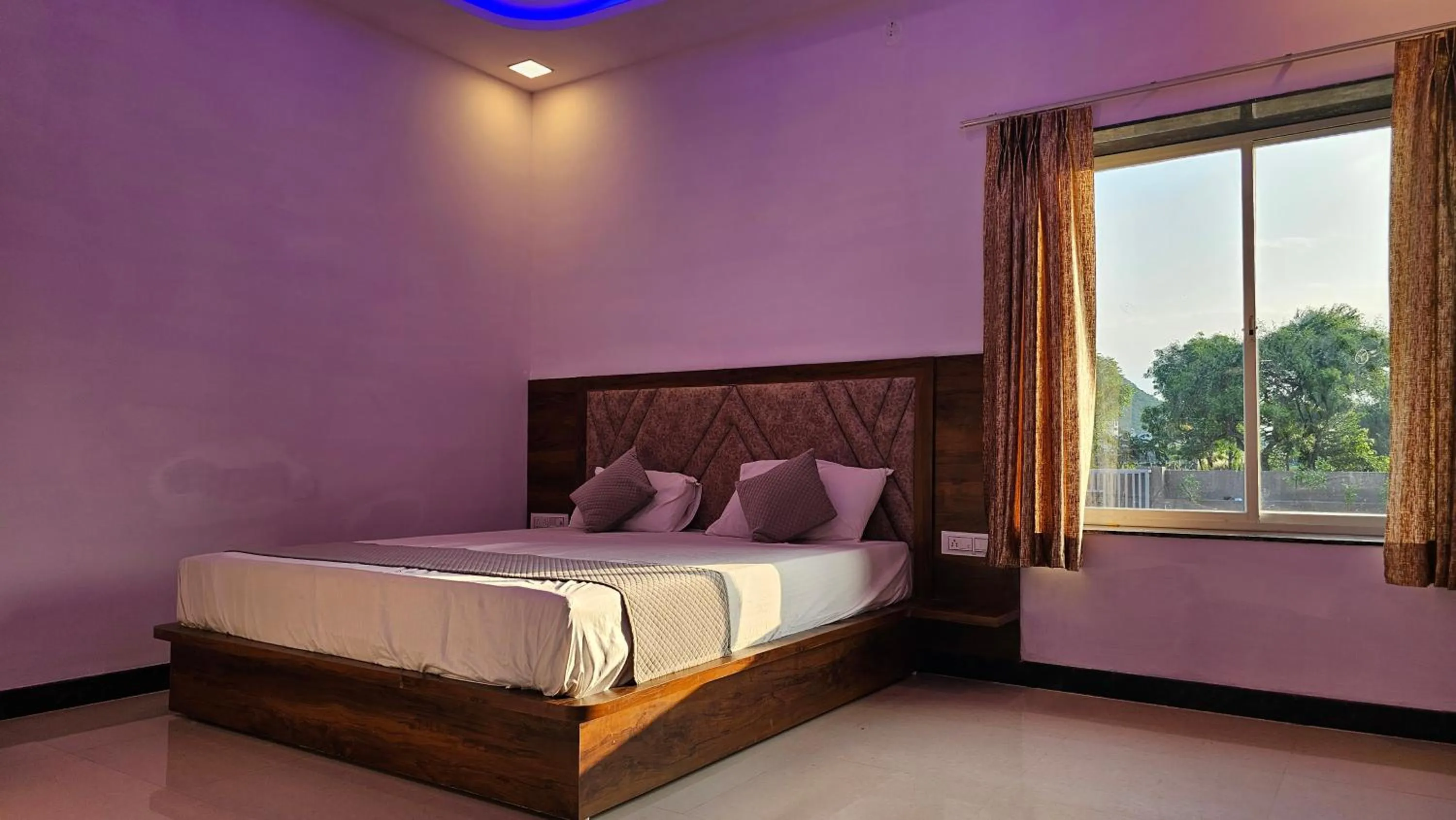 Bed in Braham Vatika Resort