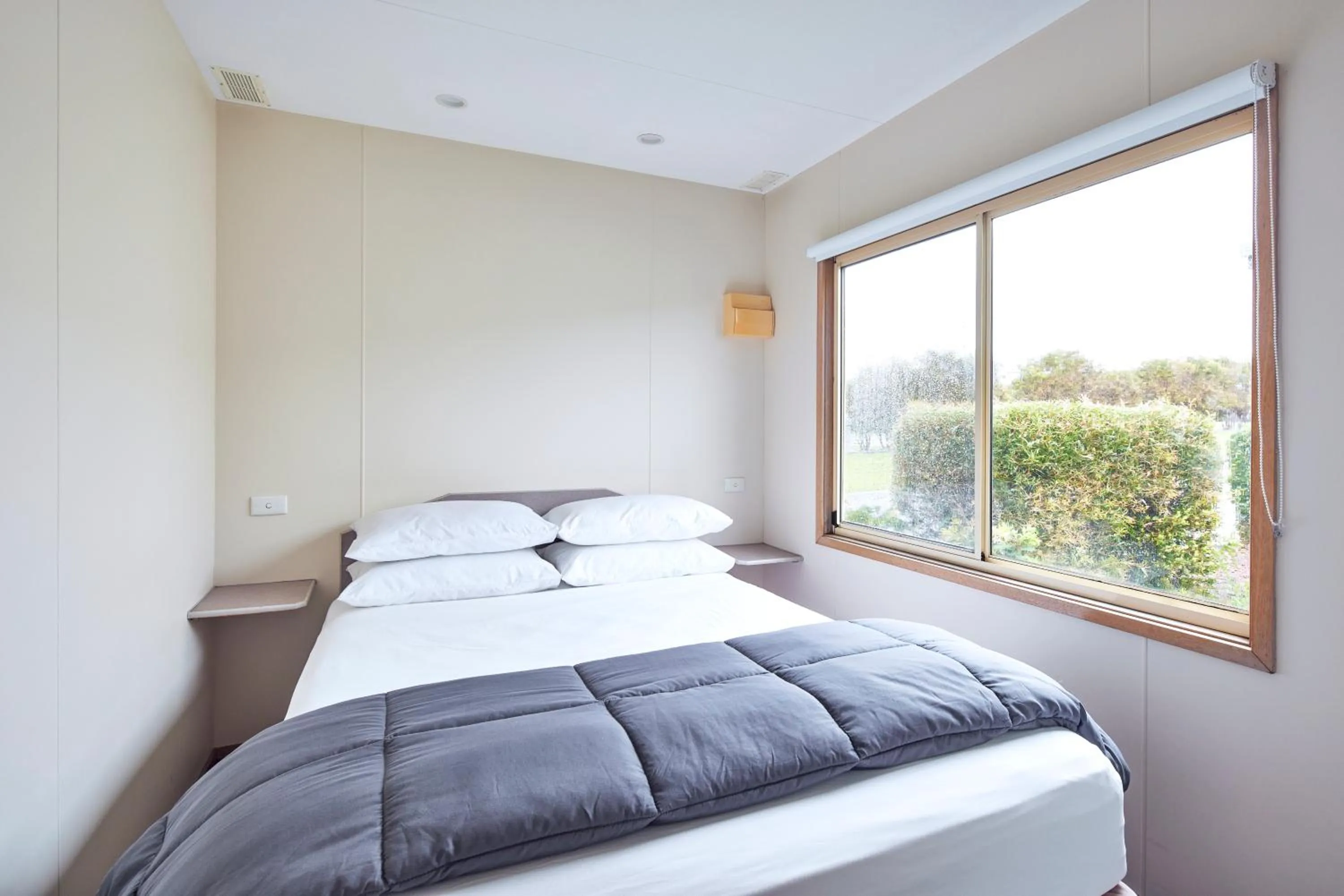 Photo of the whole room, Bed in NRMA Merimbula Beach Holiday Resort