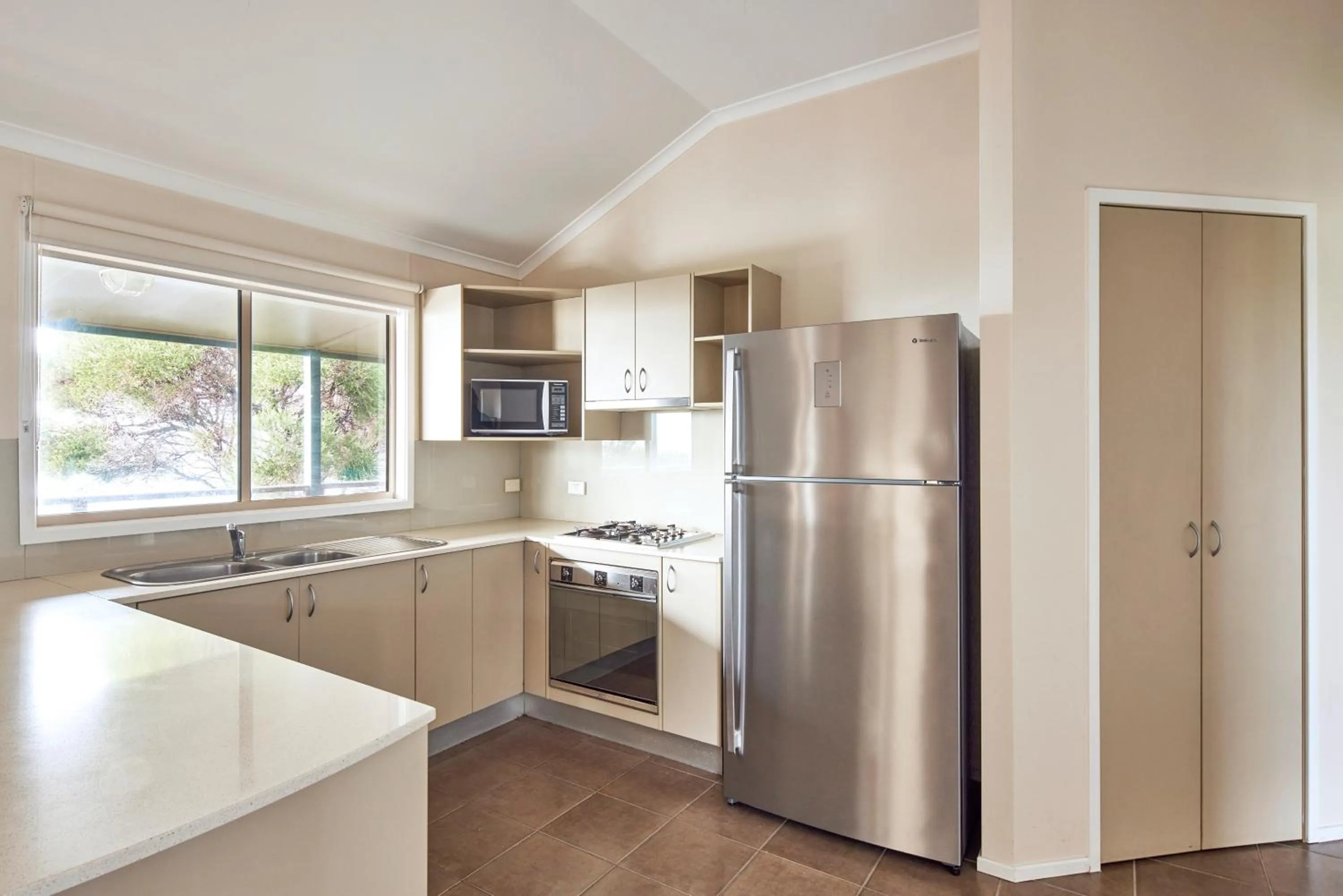 Kitchen or kitchenette in NRMA Merimbula Beach Holiday Resort