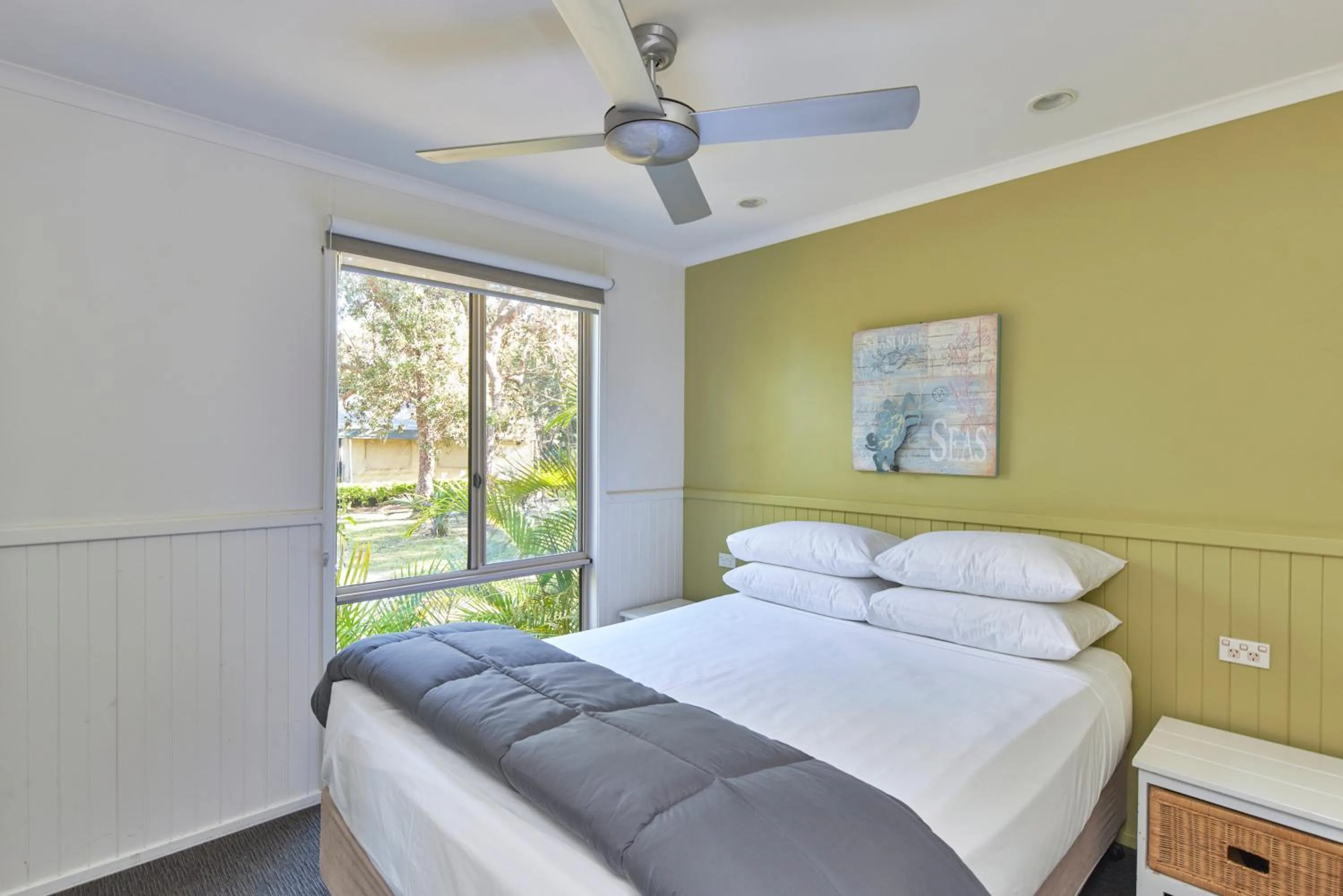 Bed in NRMA Ocean Beach Holiday Resort