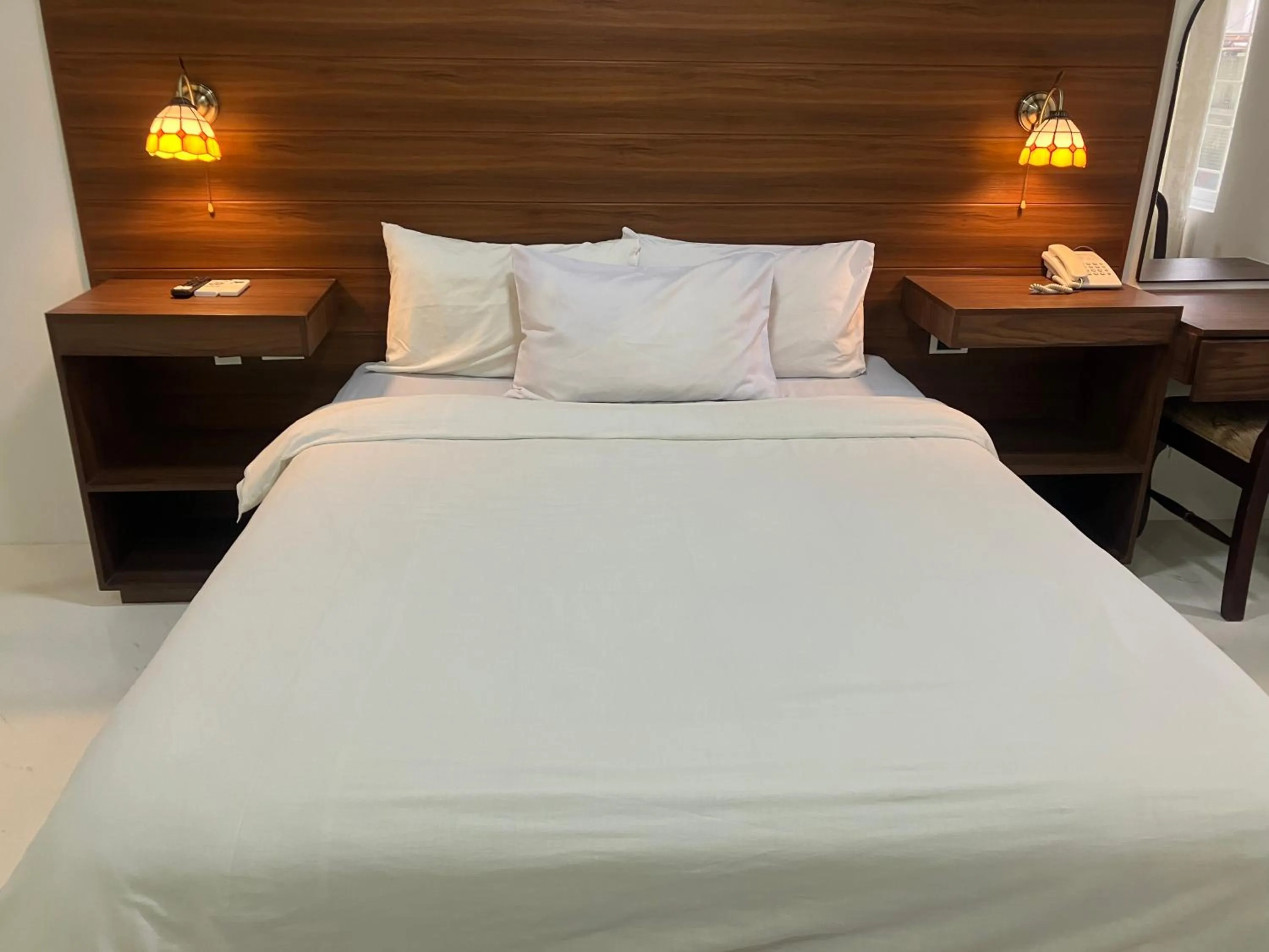 Bed in Buena Casa Hotel