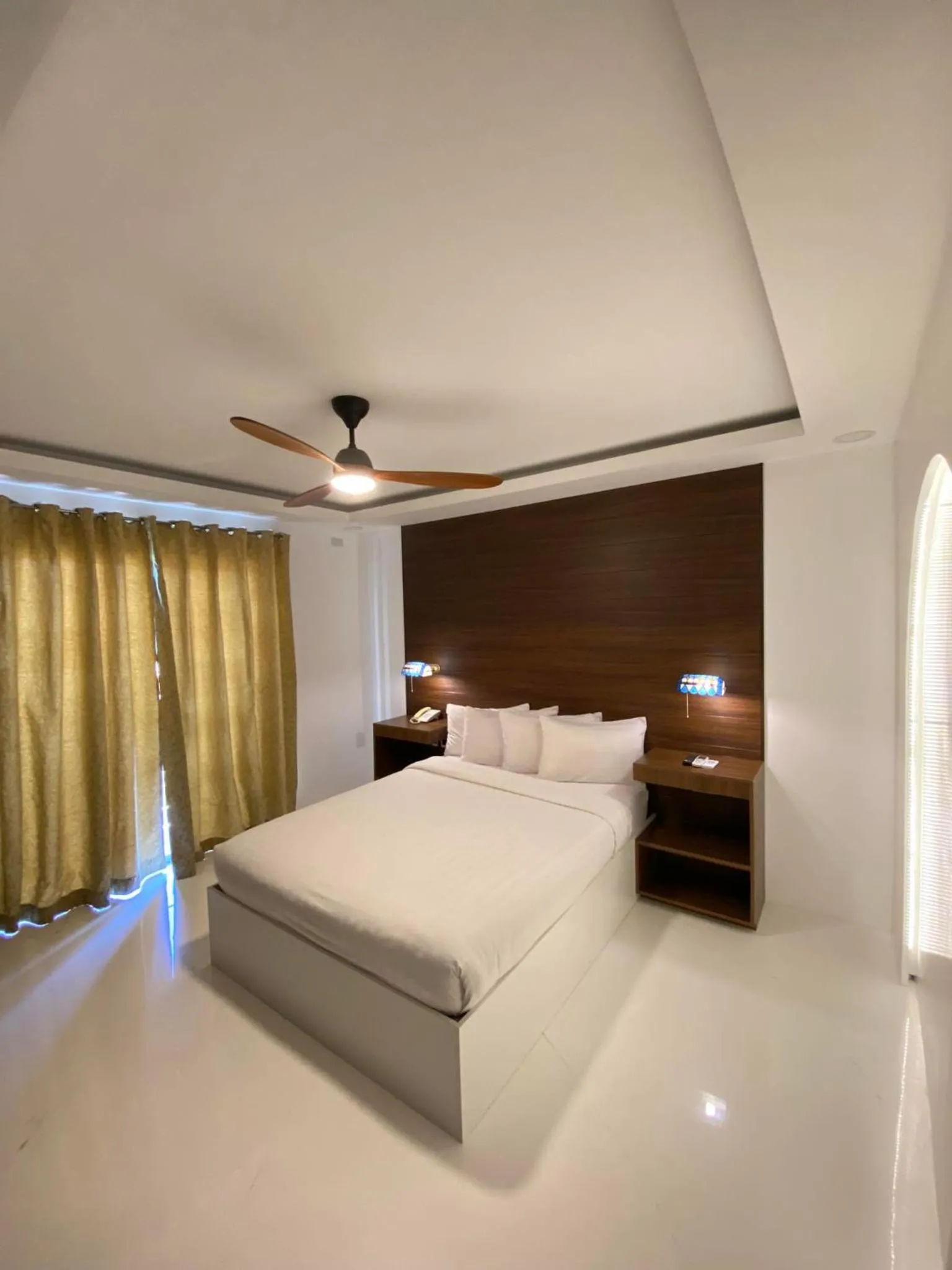 Bed in Buena Casa Hotel