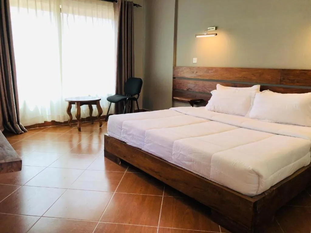 Bedroom in Meley Impala Hotel