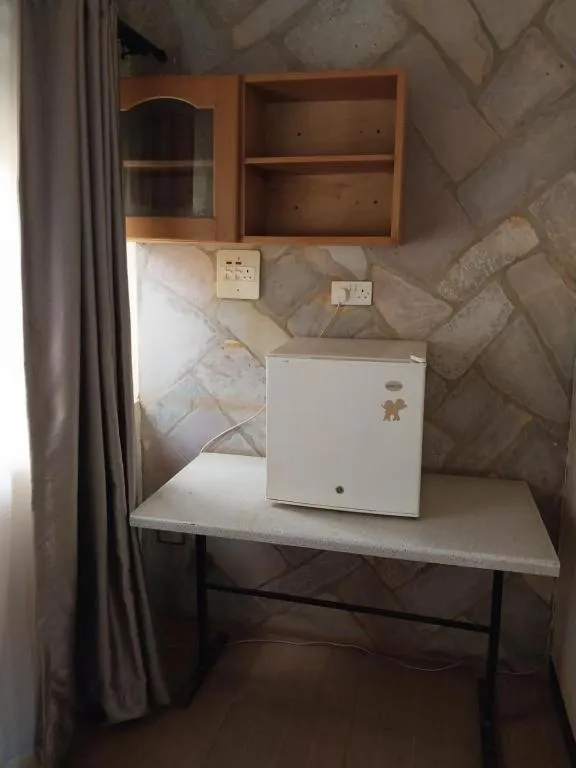 Seating area in Meley Impala Hotel