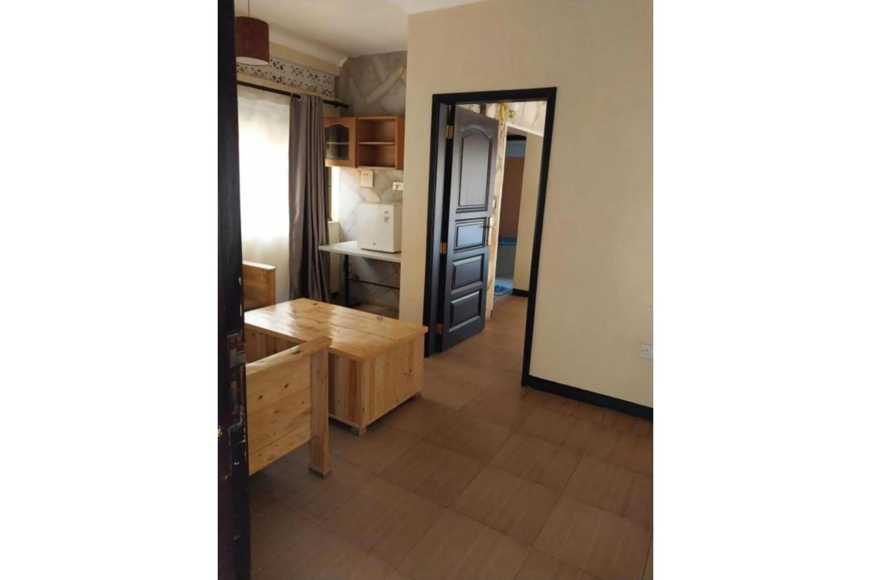 Seating area in Meley Impala Hotel