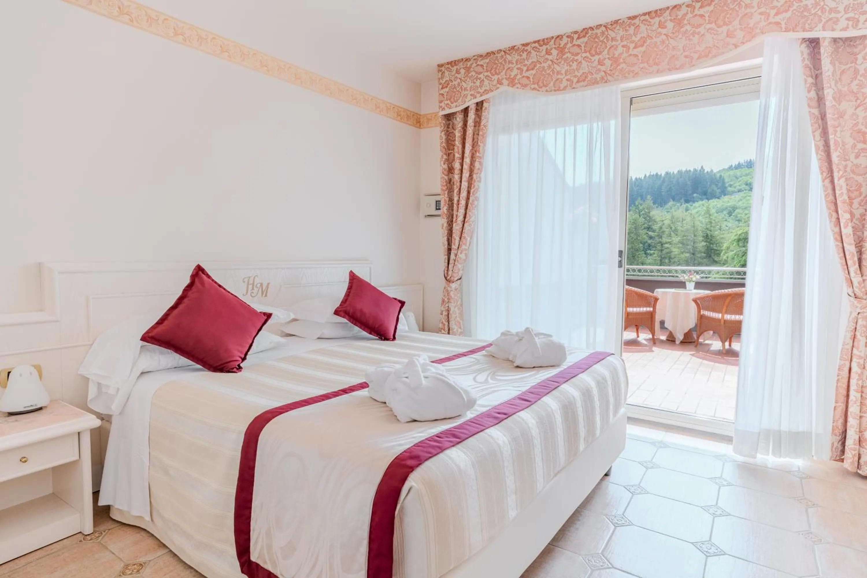 Bed in Hotel Miramonti