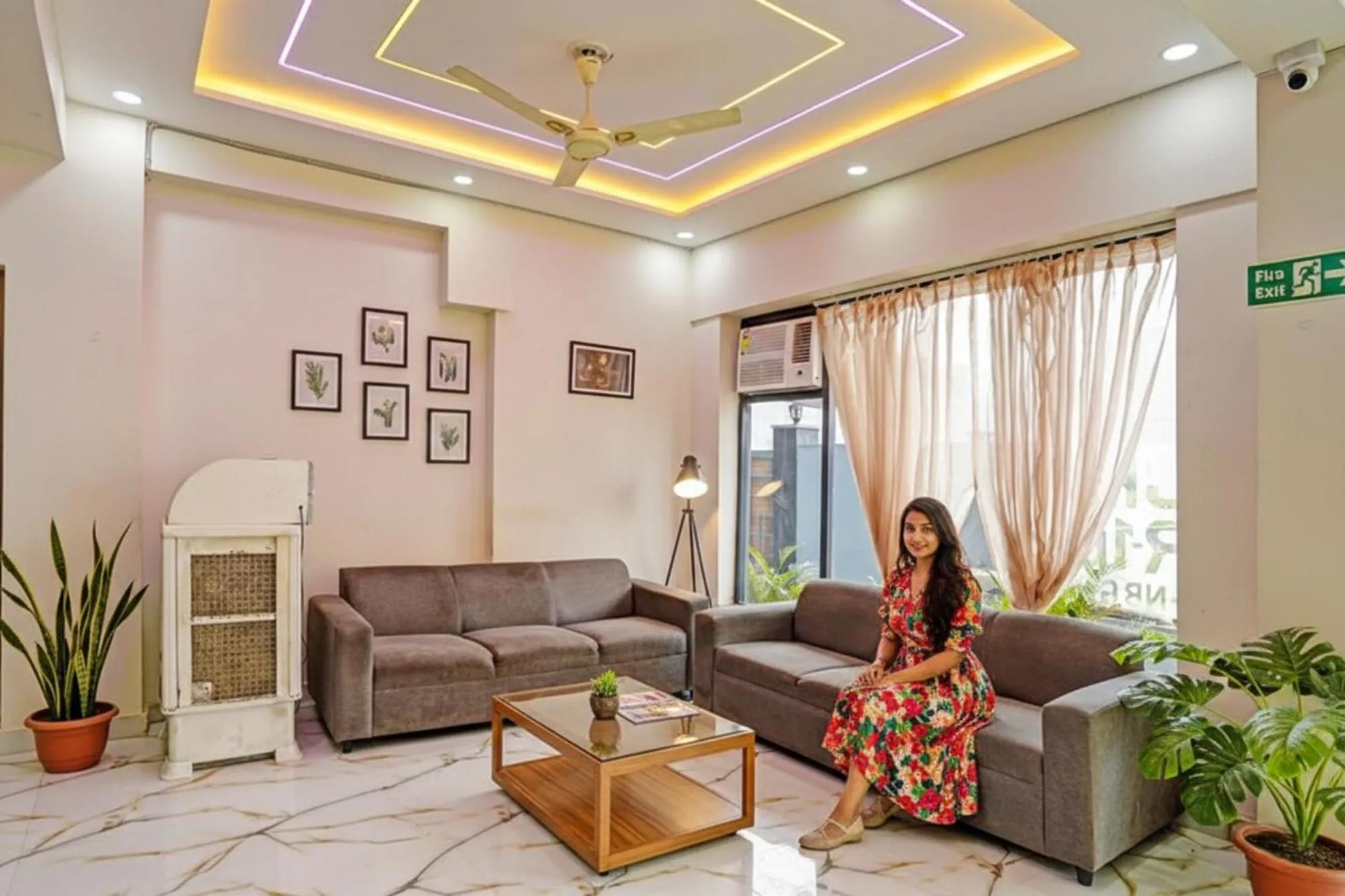 Seating area in FabHotel The Viraaj - Gaur City Mall