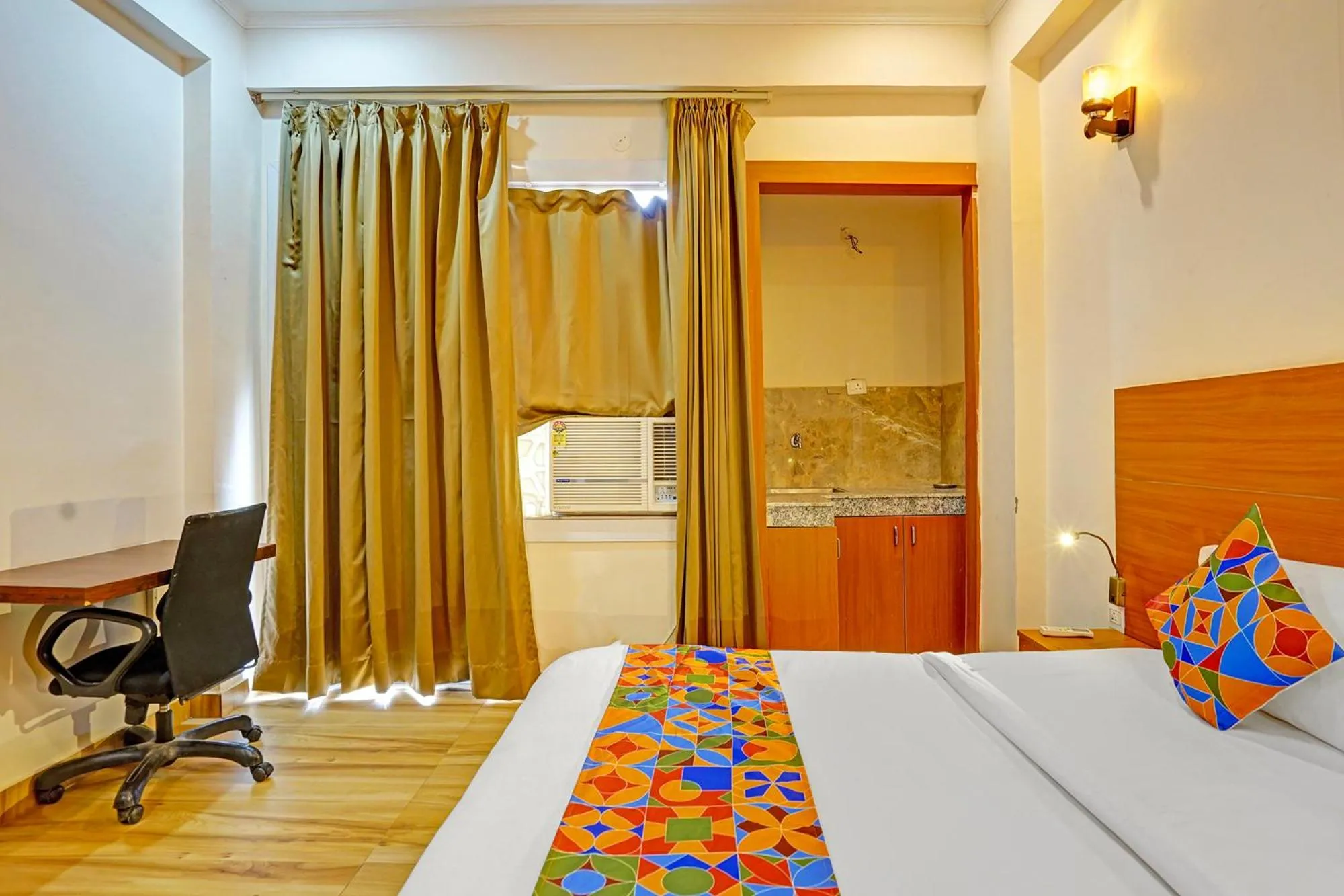 Bed in FabHotel The Viraaj - Gaur City Mall