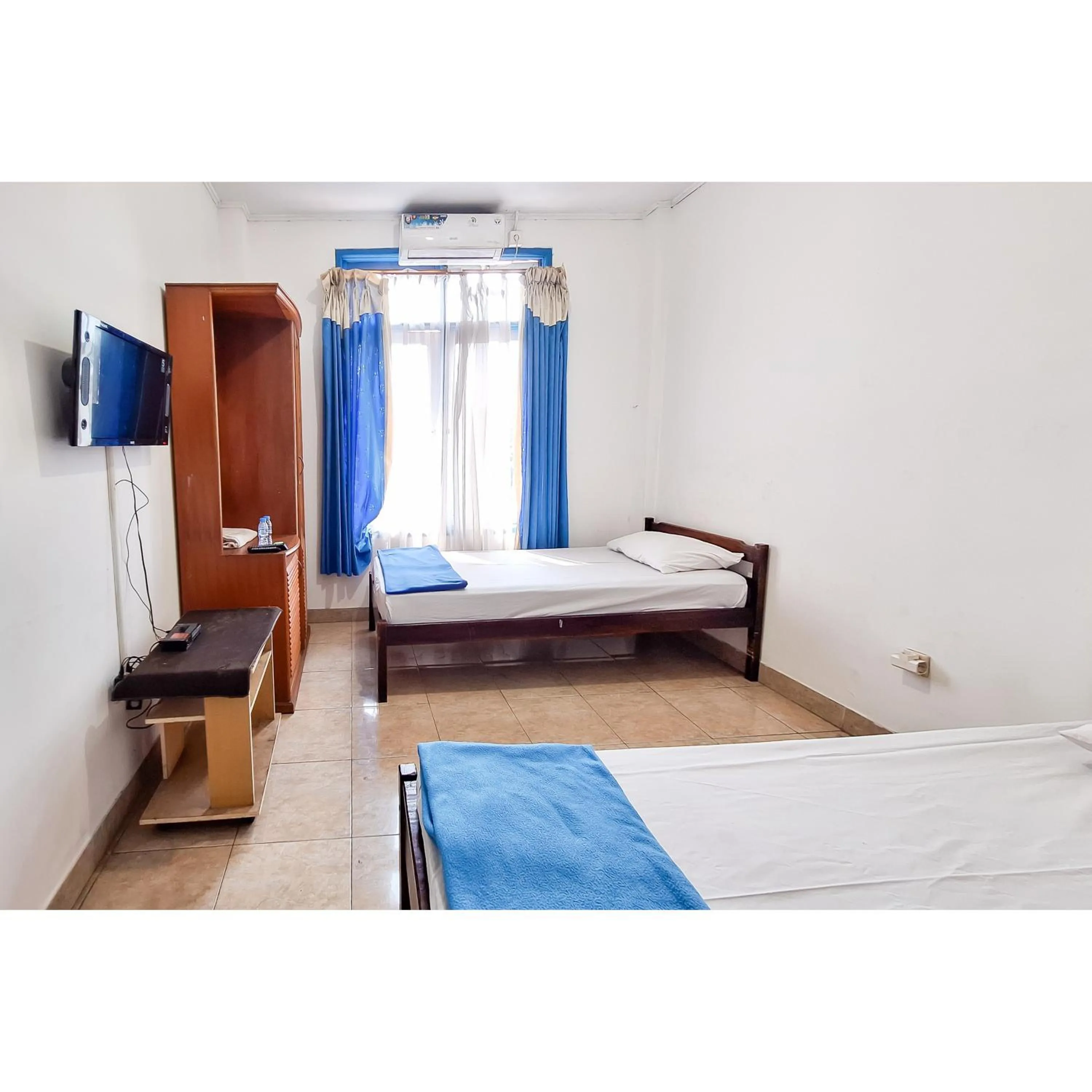 Bedroom, Bed in Wisma PKBI Jabar Mitra RedDoorz